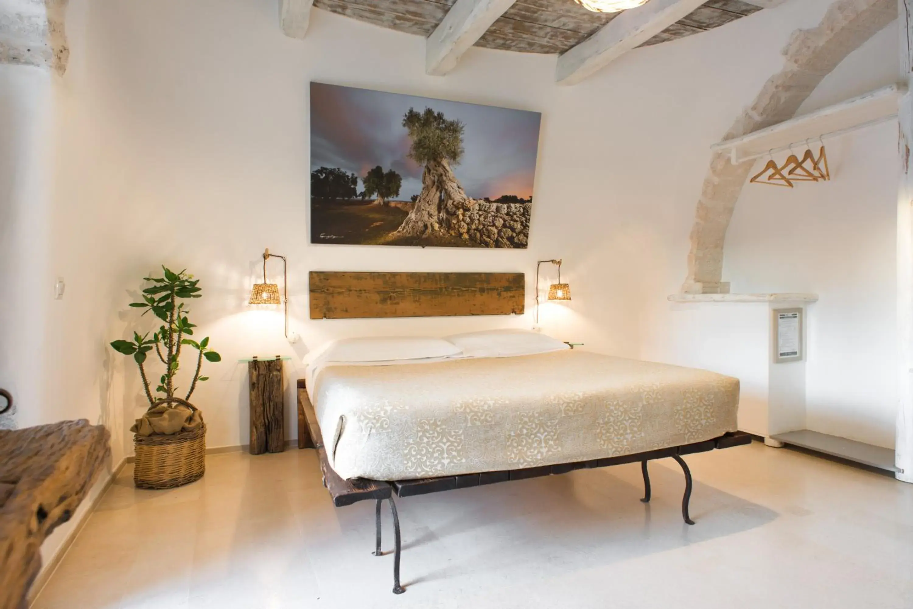 Bed in Trulli Holiday Deluxe & Wellness Bed in Trulli Holiday Deluxe & Wellness