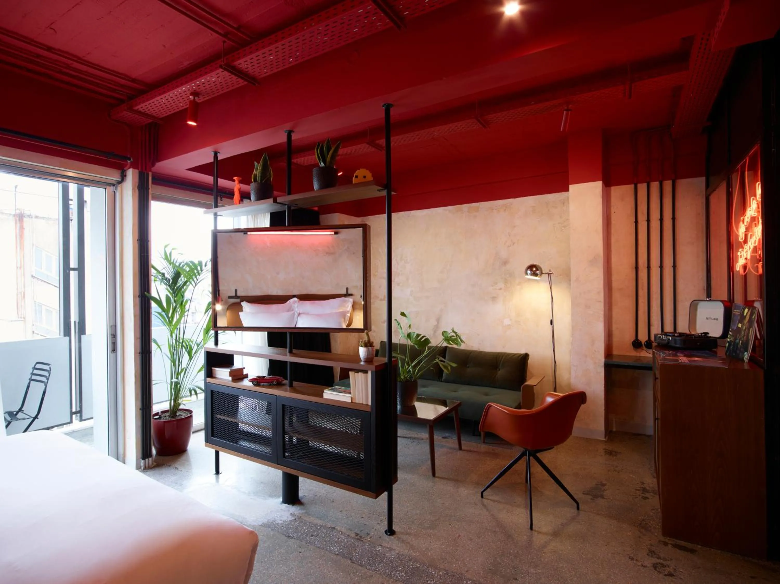 Seating area, Bed in Max Brown Hotel Downtown Part of Sircle Collection Formally known as Dave Red