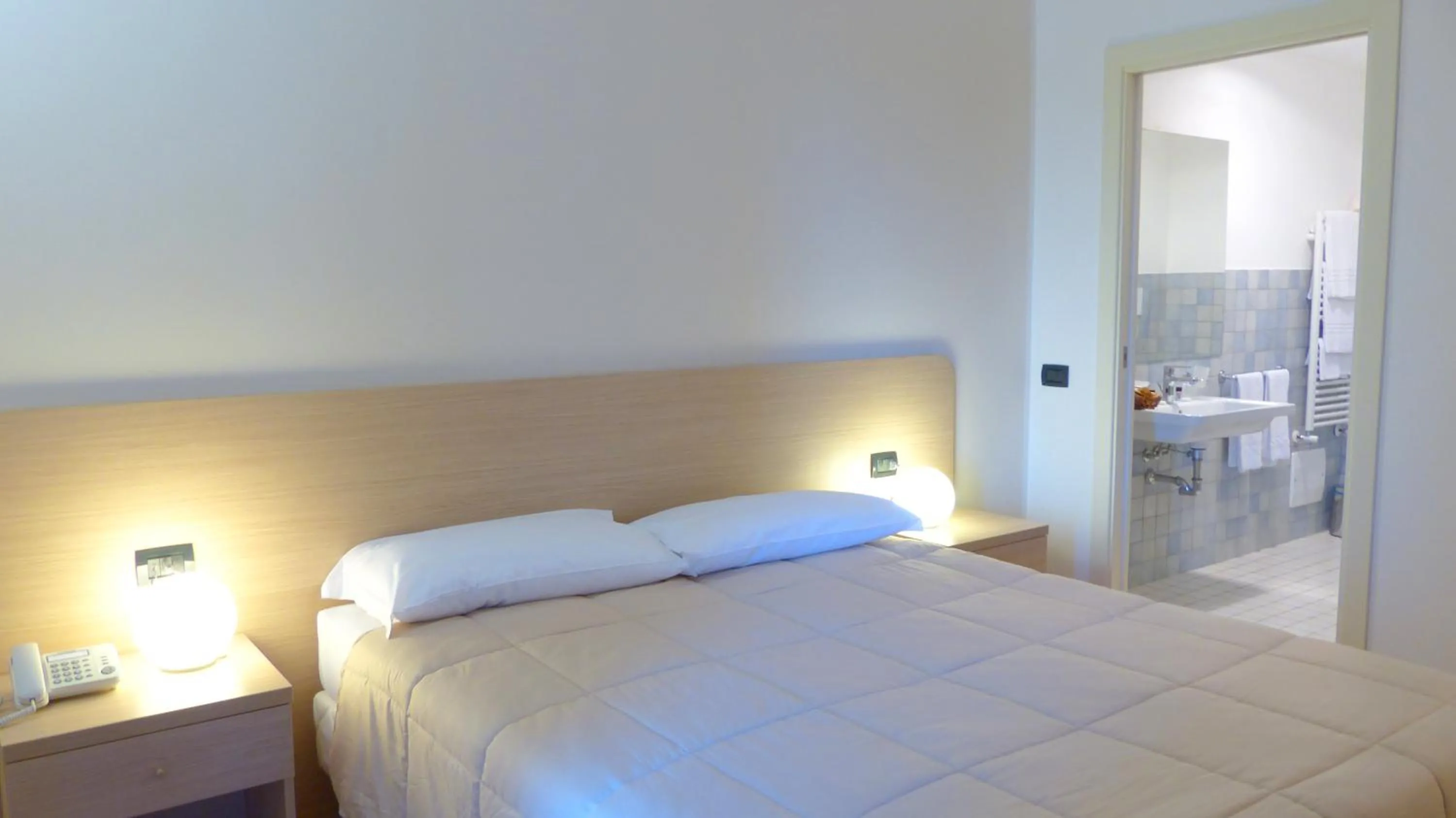 Bed in Mercury Boutique Hotel