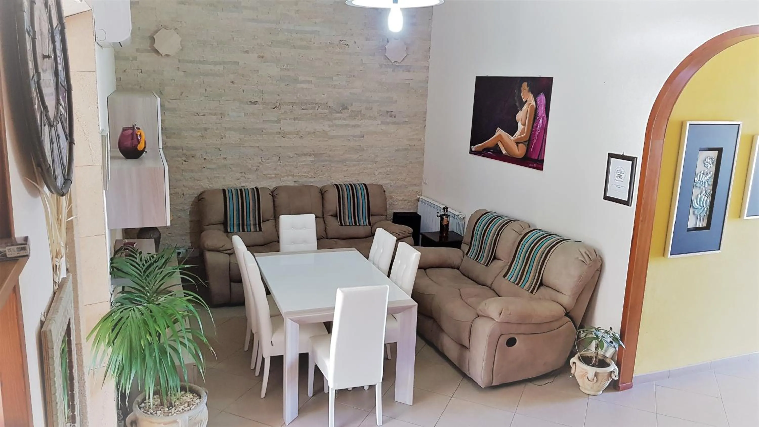 Communal lounge/ TV room in B&B Gi & Giò