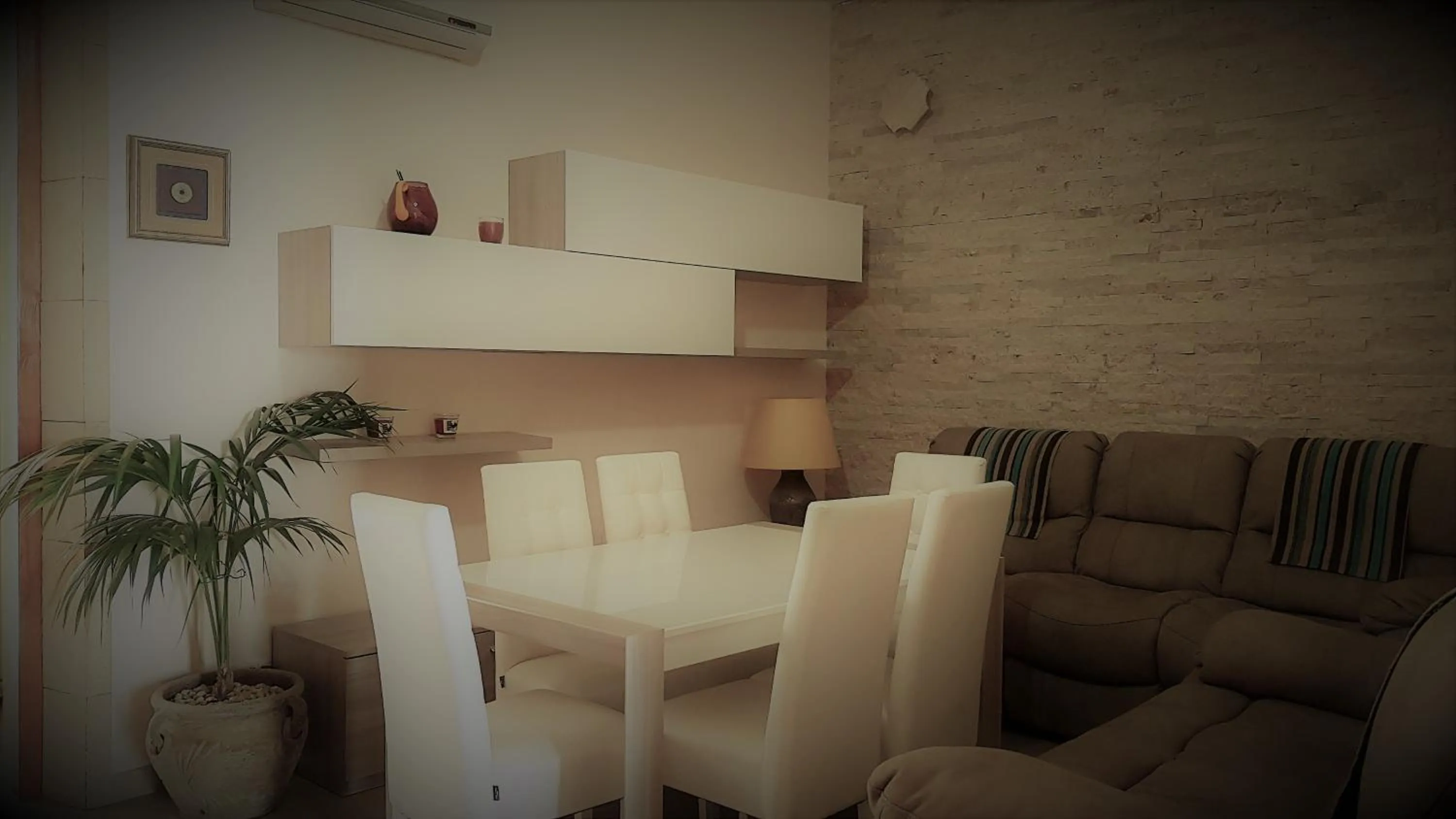 Communal lounge/ TV room in B&B Gi & Giò