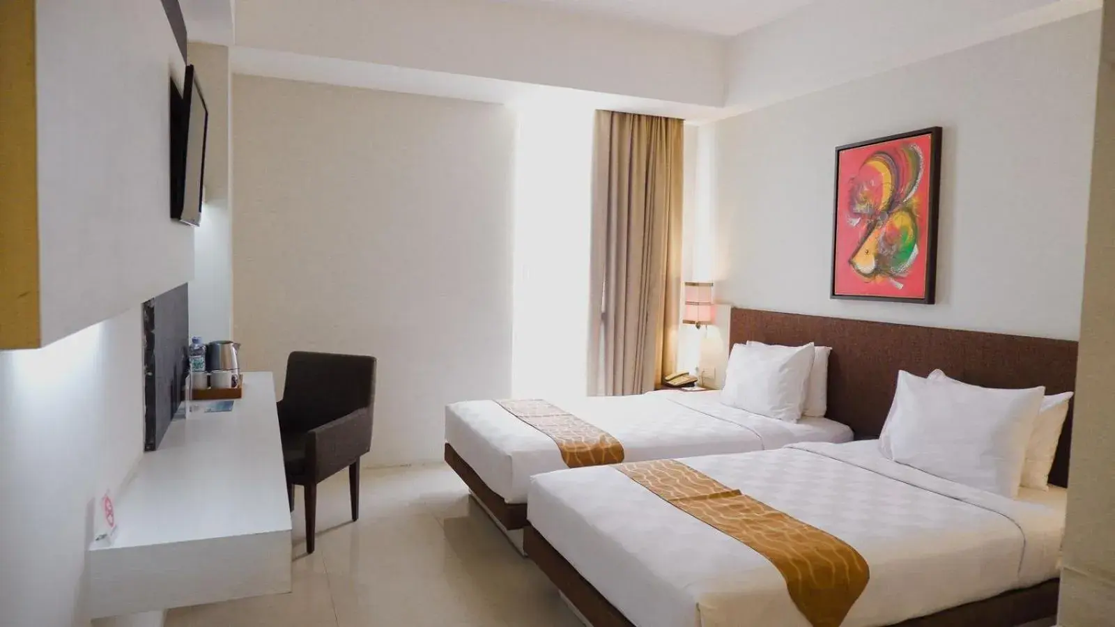 Bed in Luxury Malioboro Hotel