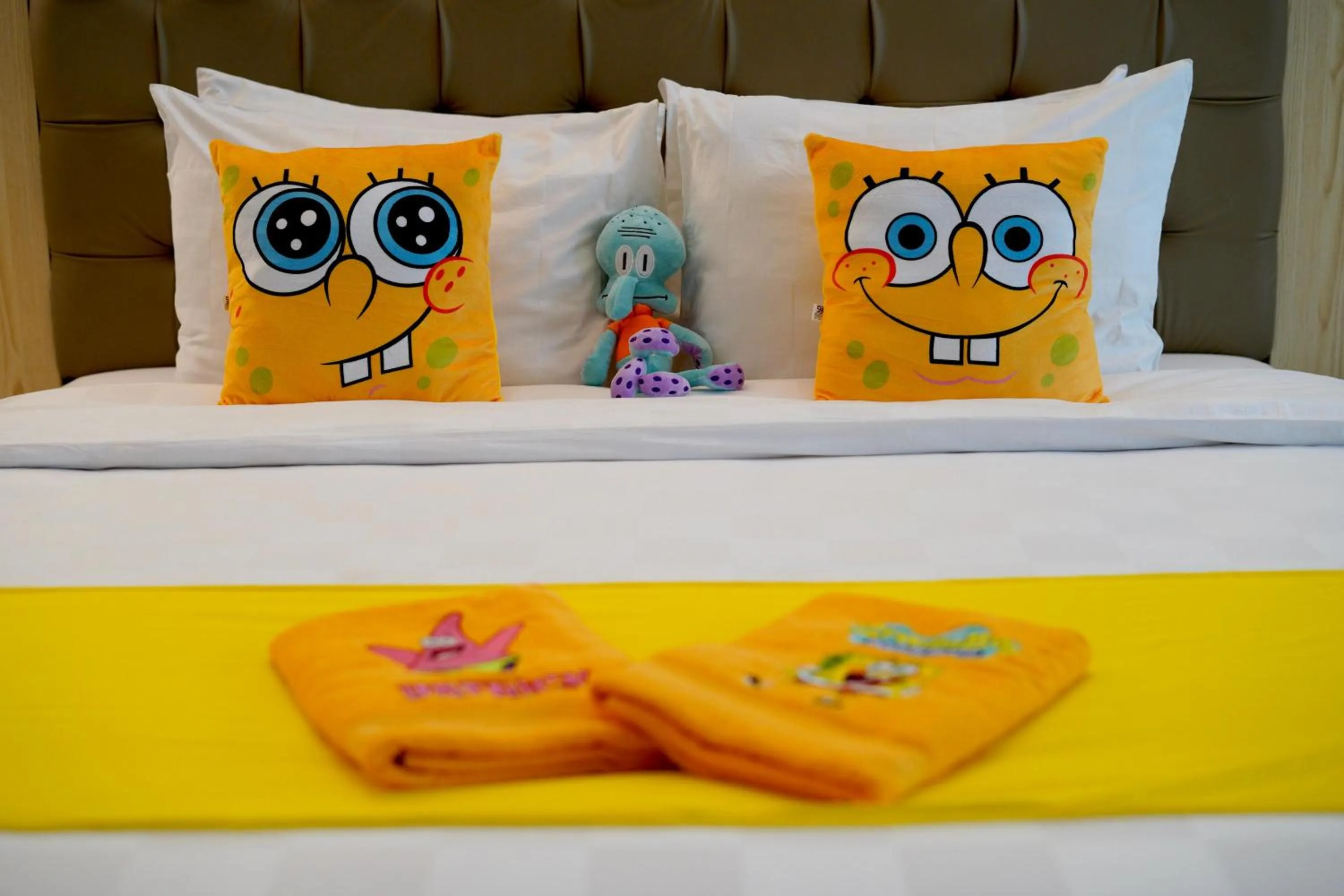 Bed in Luxury Malioboro Hotel