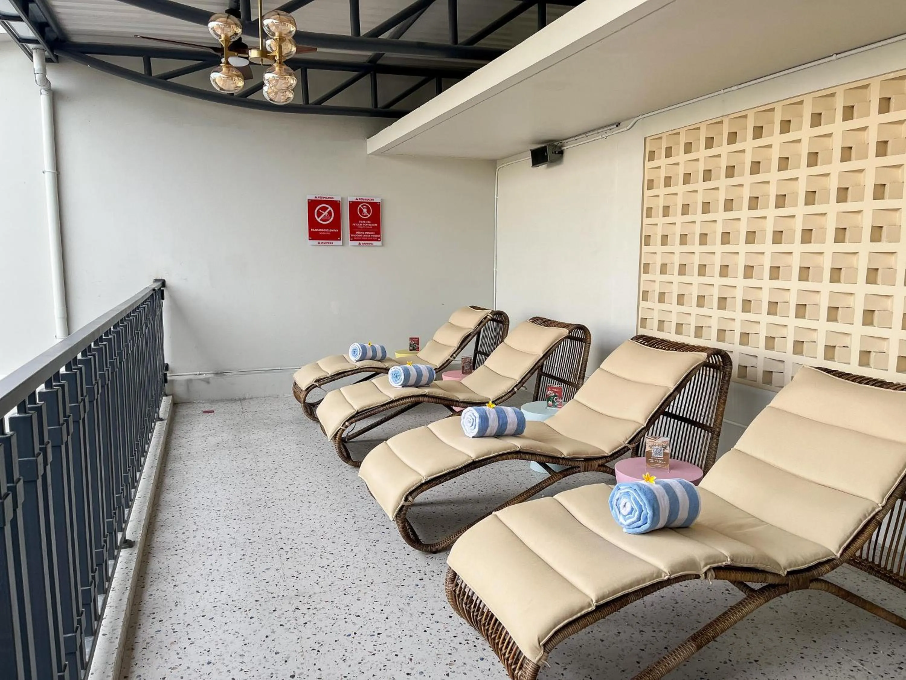 Seating area in Luxury Malioboro Hotel