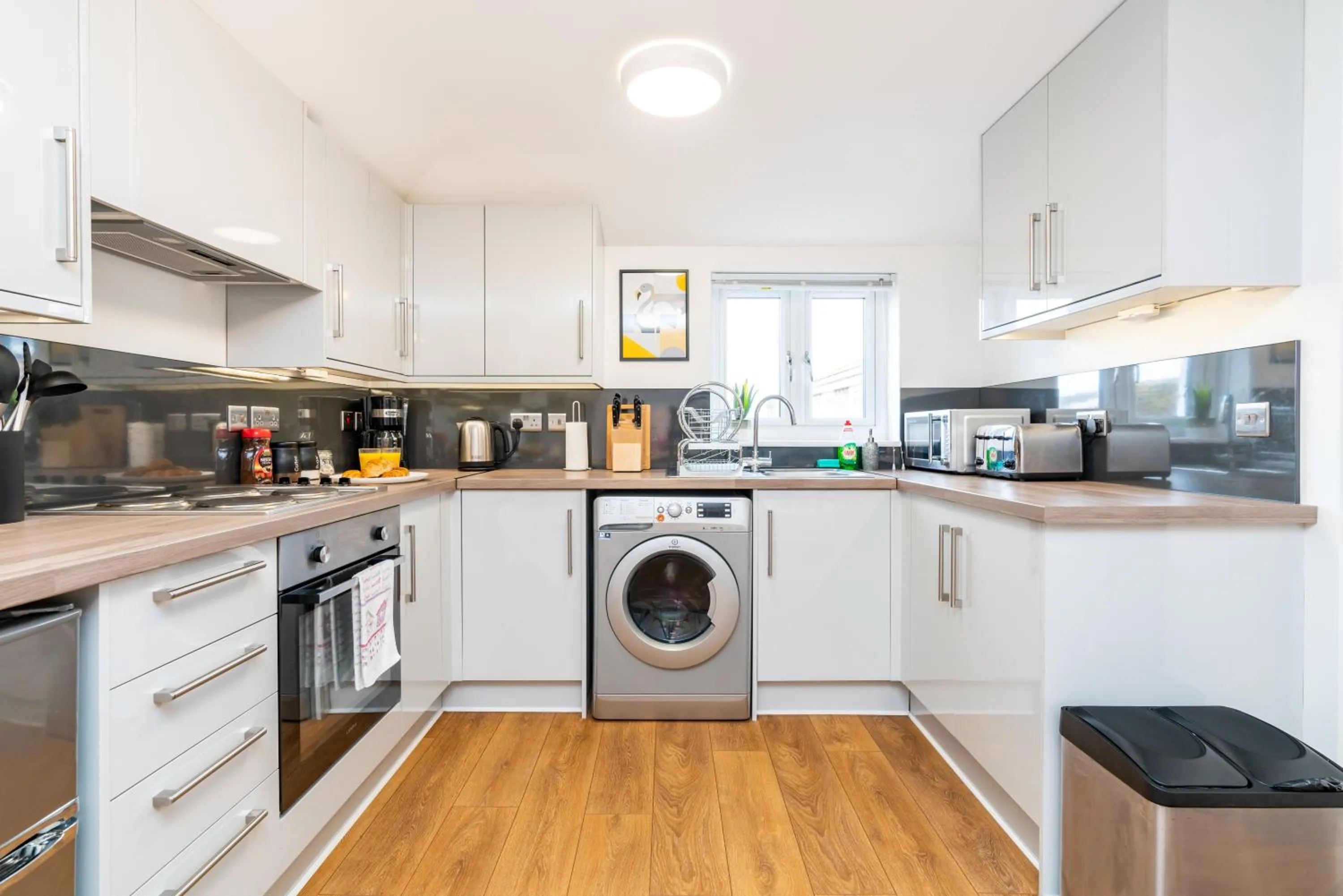 Kitchen or kitchenette in Town Center Apartment with 55” Smart TV+Netflix