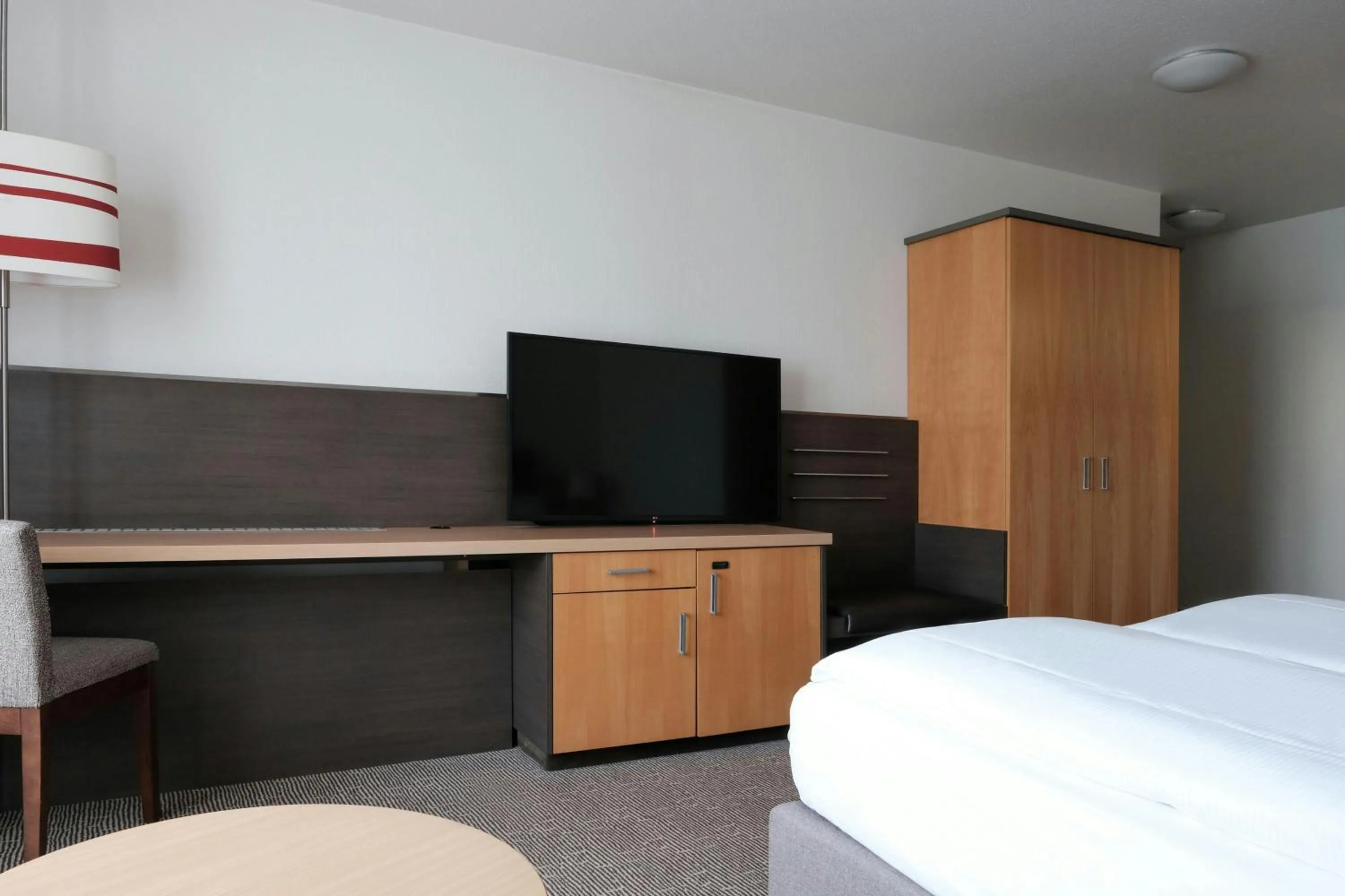 Photo of the whole room, Bed in FOUR Essen City Centre