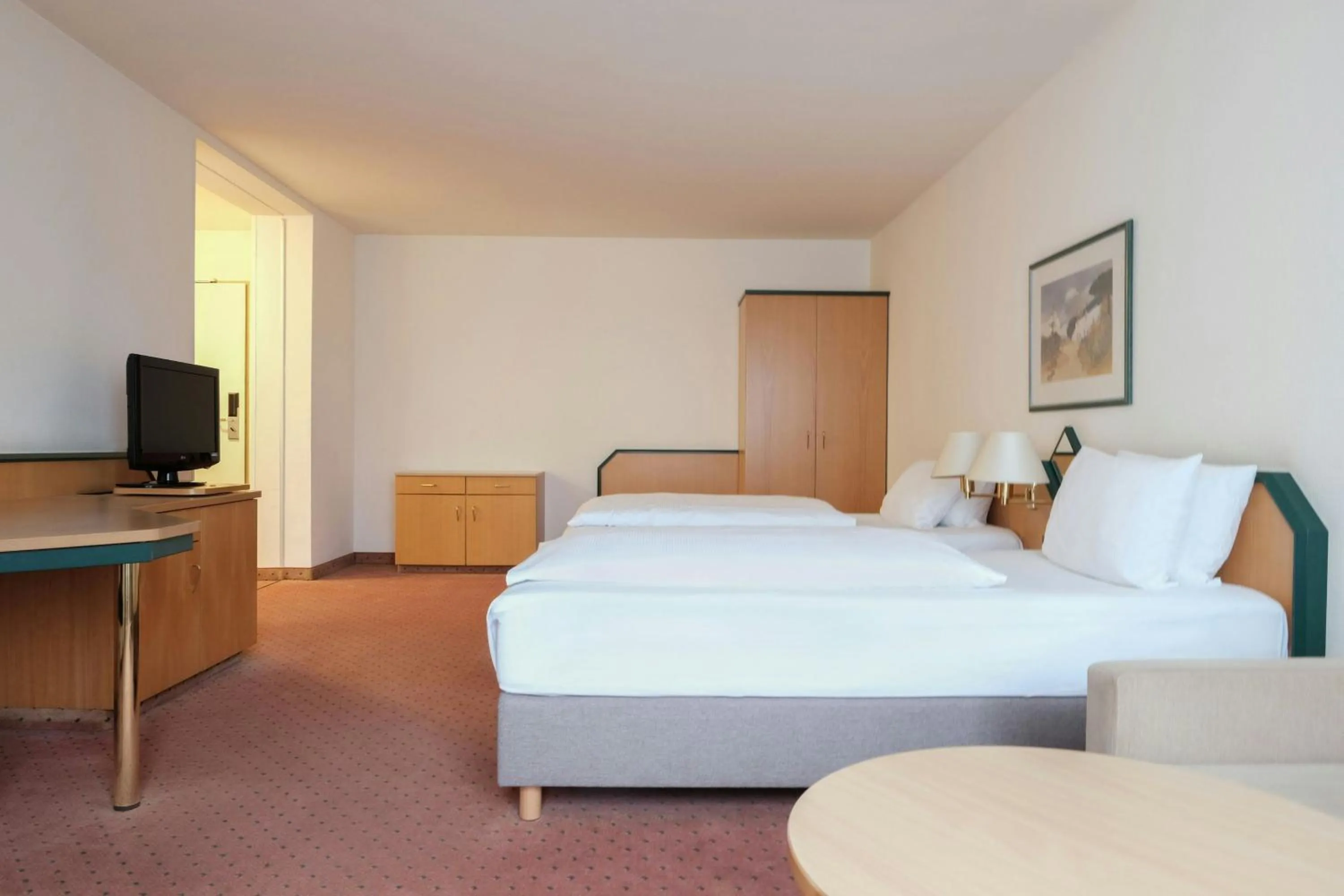 Photo of the whole room, Bed in FOUR Essen City Centre