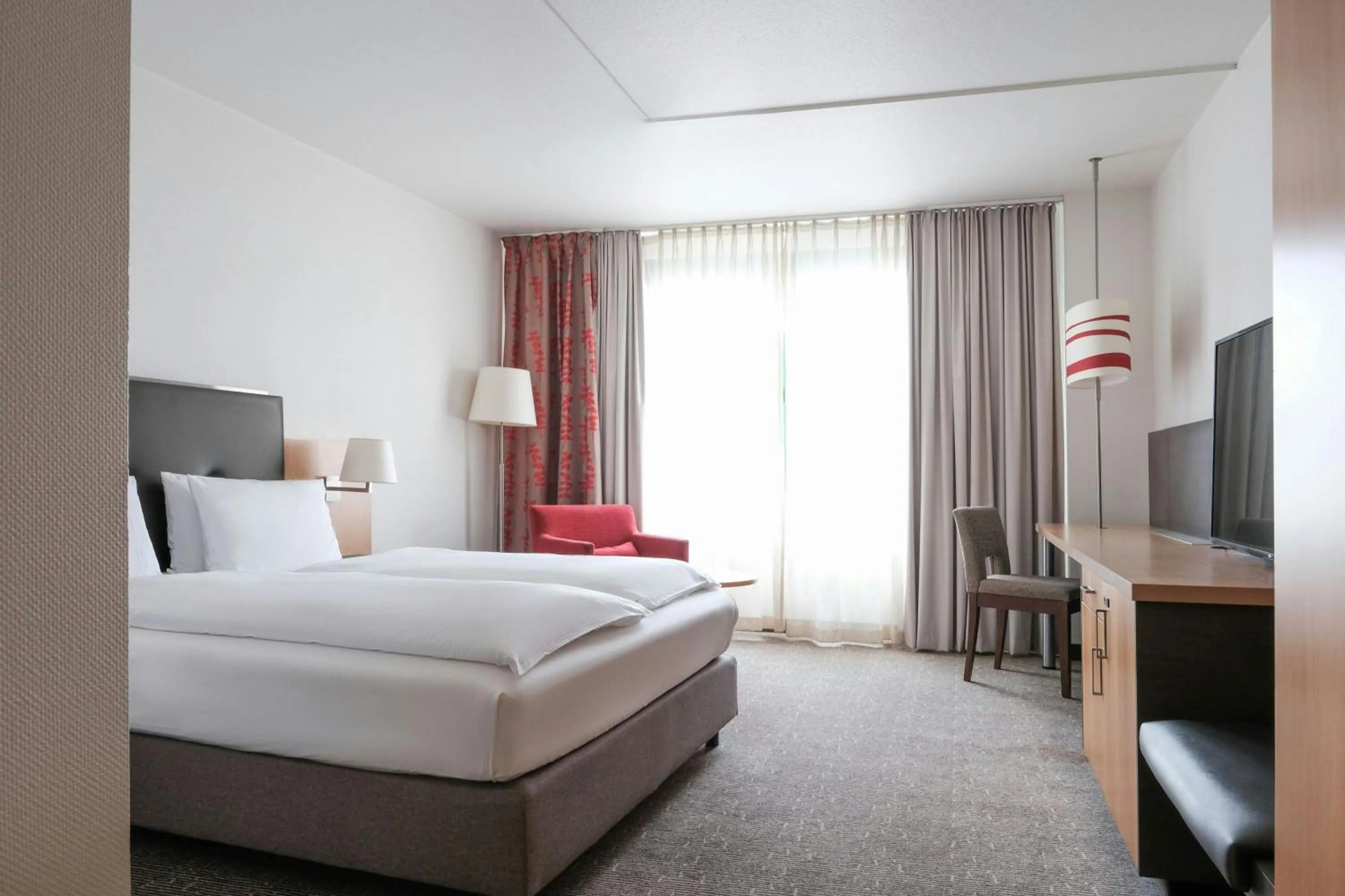 Photo of the whole room, Bed in FOUR Essen City Centre