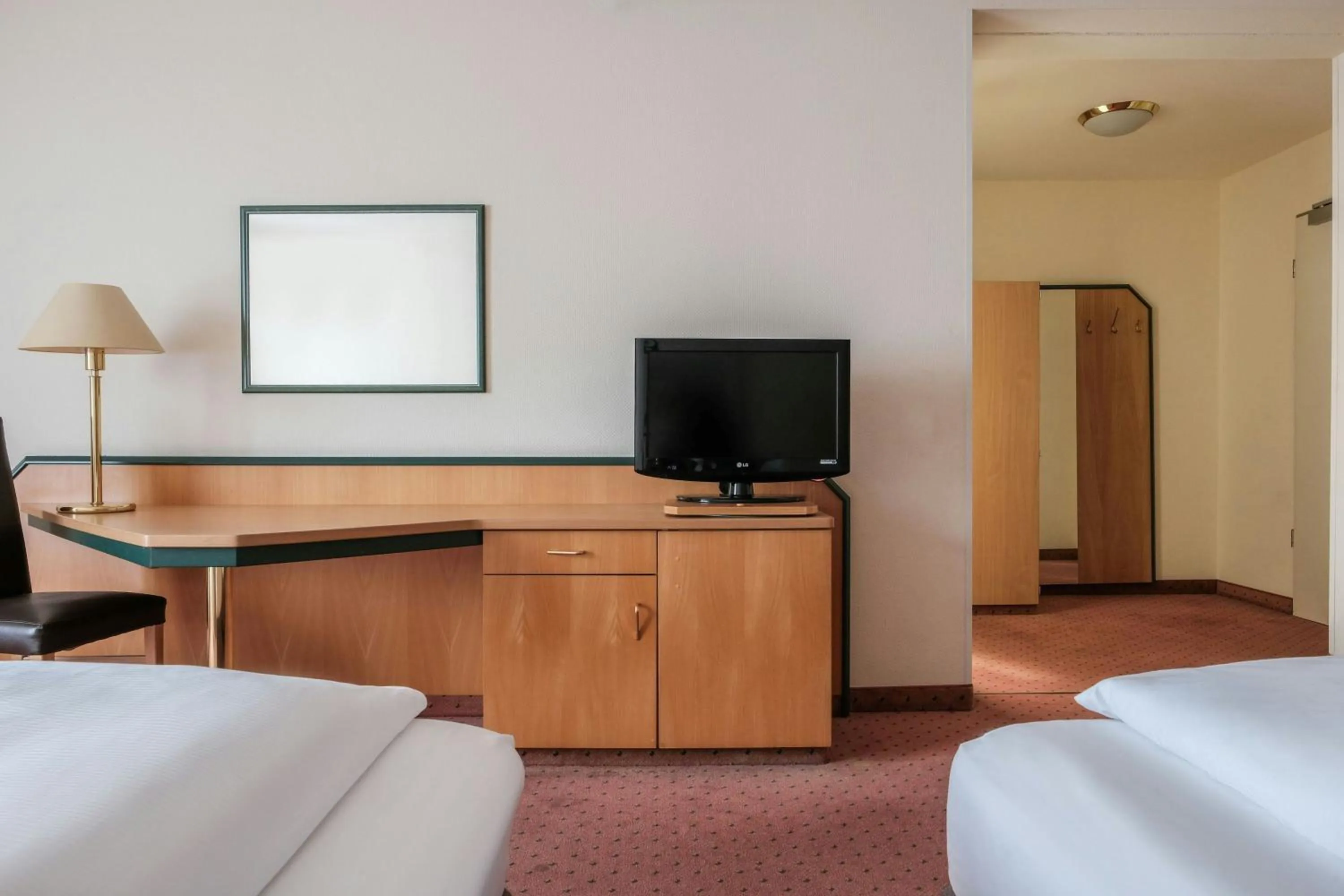 Photo of the whole room, Bed in FOUR Essen City Centre