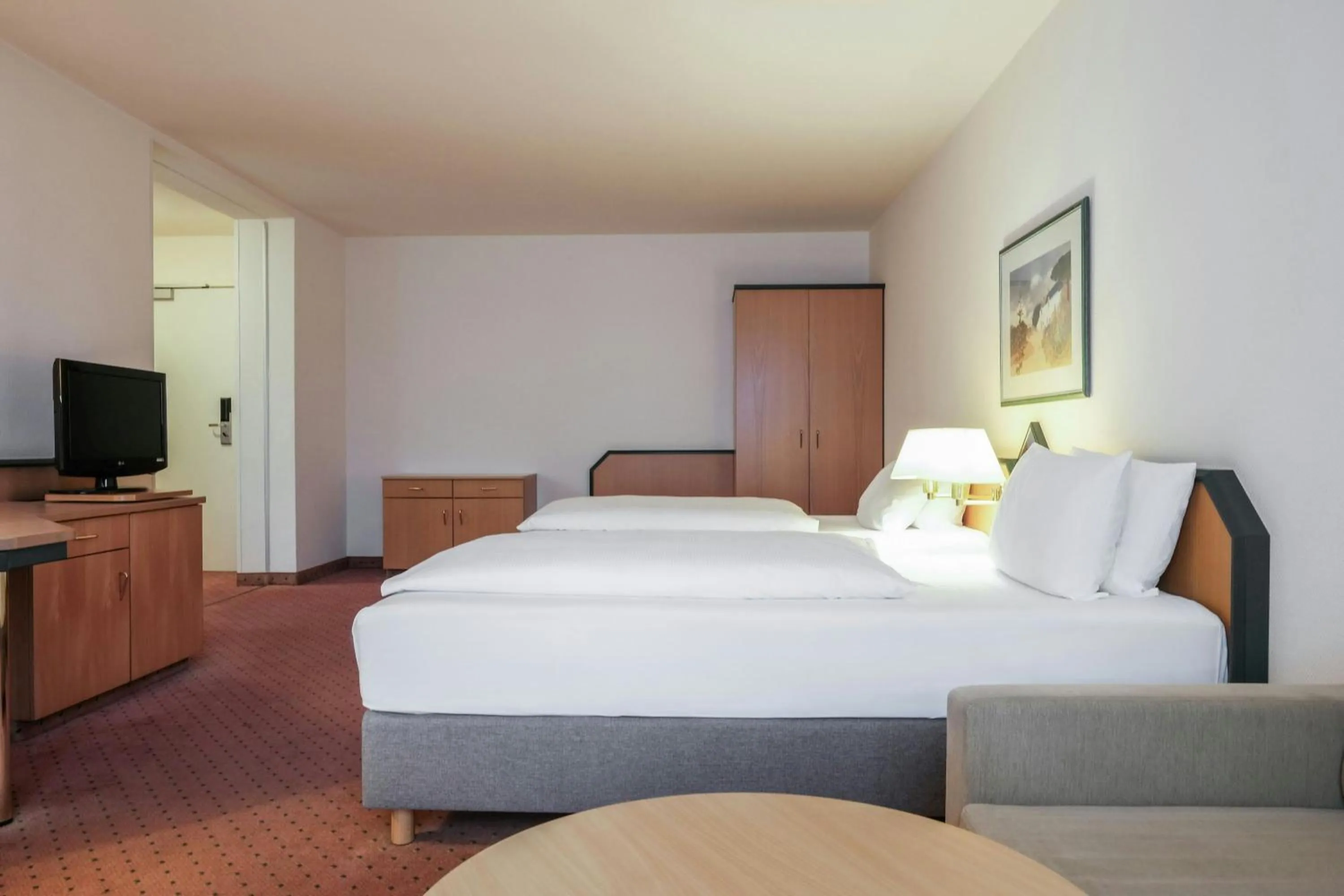 Photo of the whole room, Bed in FOUR Essen City Centre