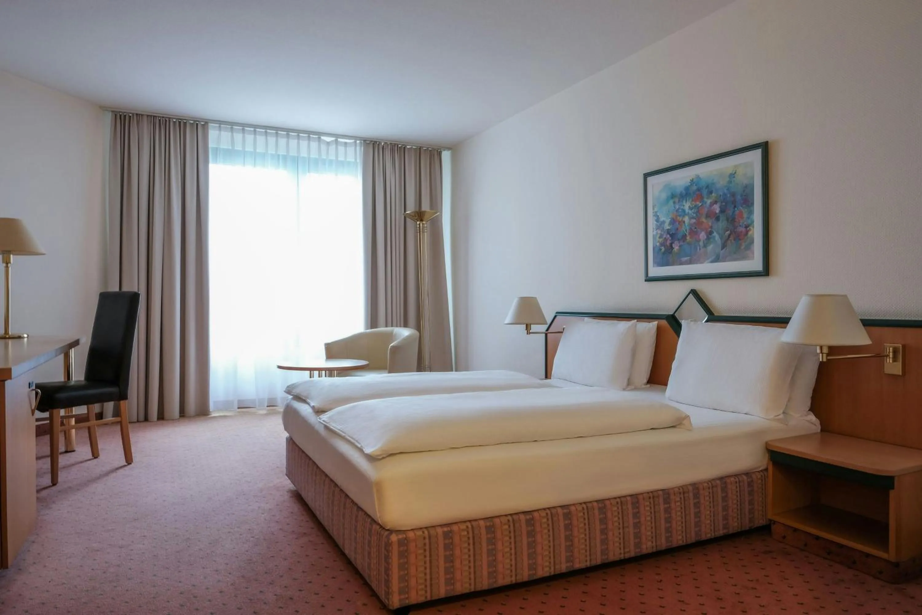 Photo of the whole room, Bed in FOUR Essen City Centre