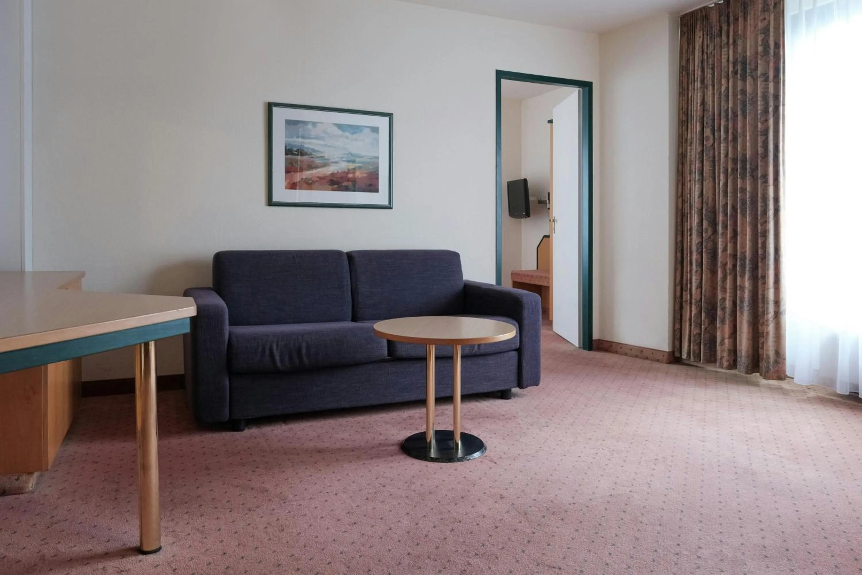 Living room in FOUR Essen City Centre