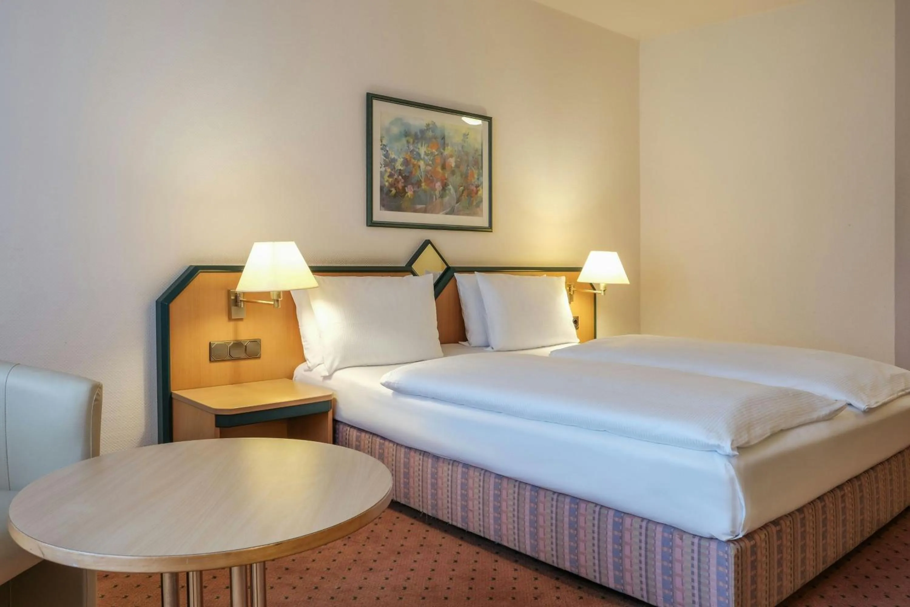 Photo of the whole room, Bed in FOUR Essen City Centre