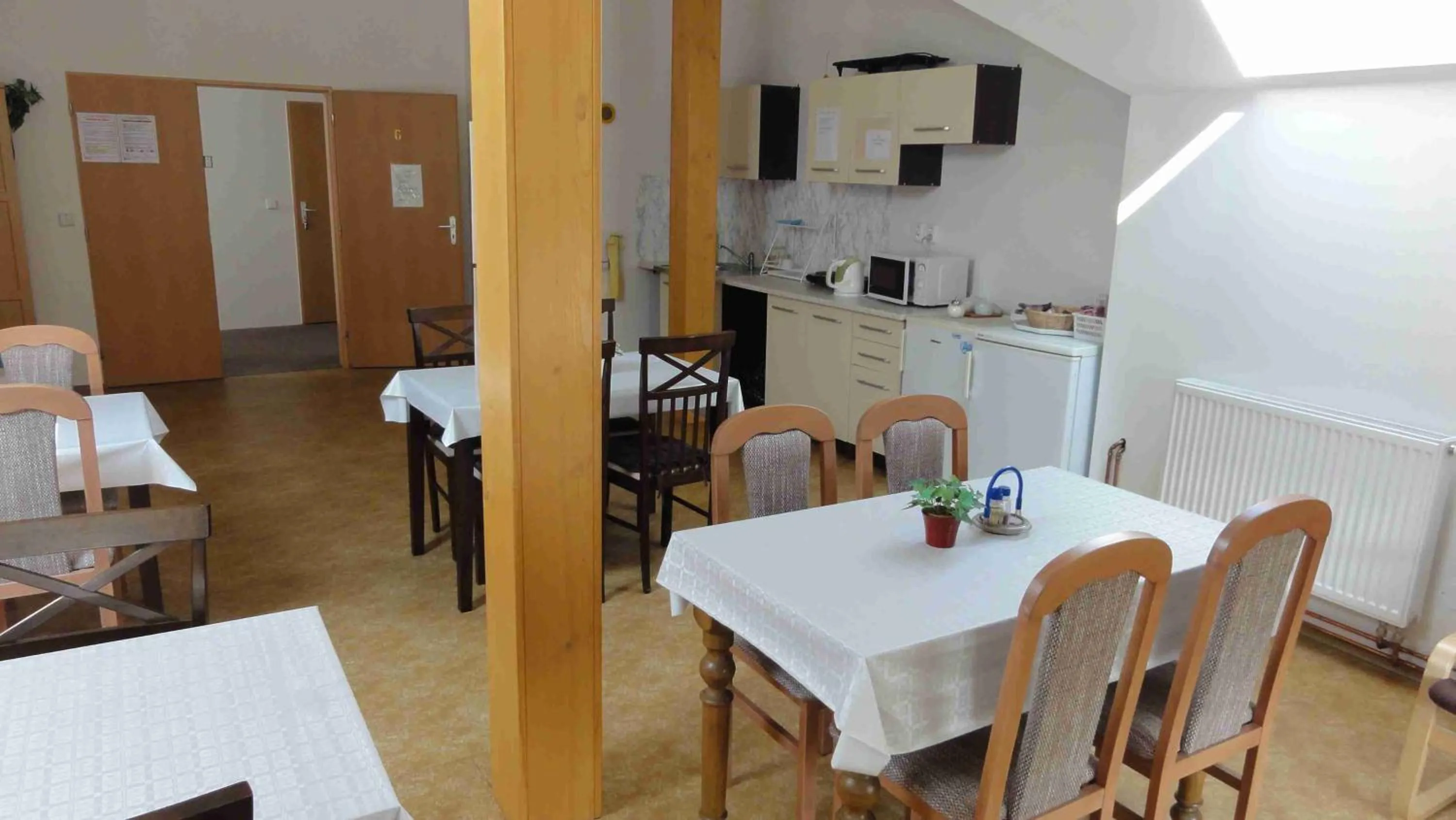 Communal lounge/ TV room in Penzion U Hradeb
