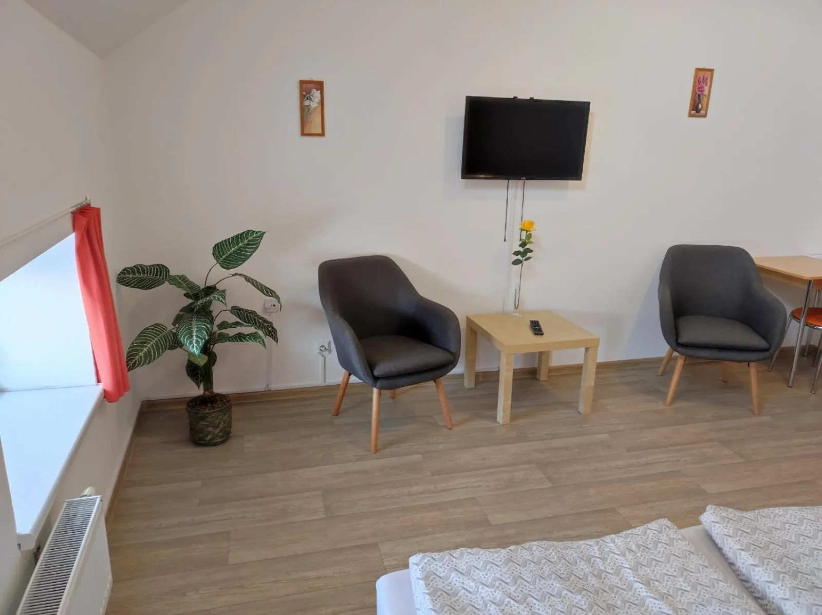 Communal lounge/ TV room in Penzion U Hradeb