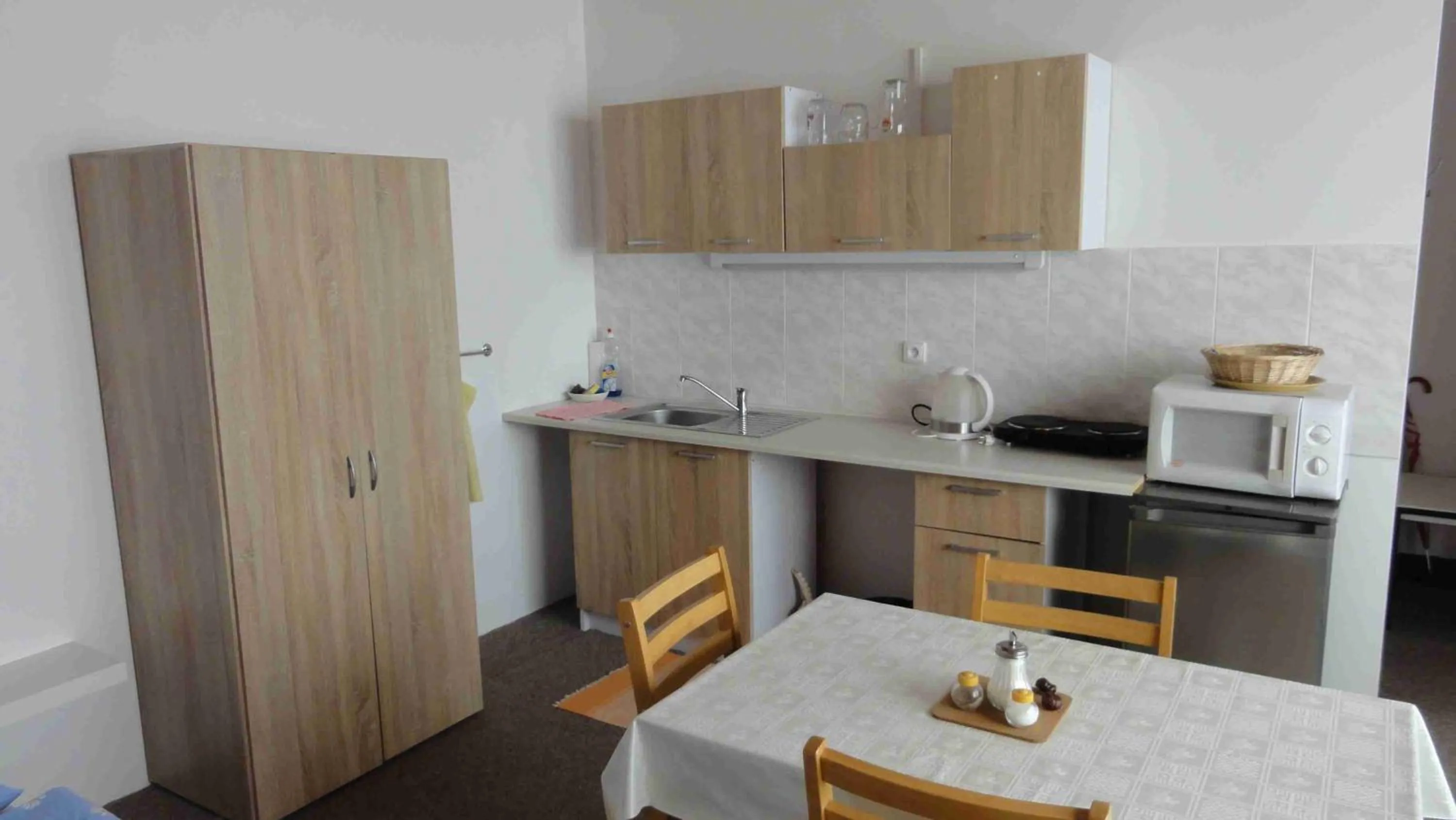 Communal lounge/ TV room in Penzion U Hradeb