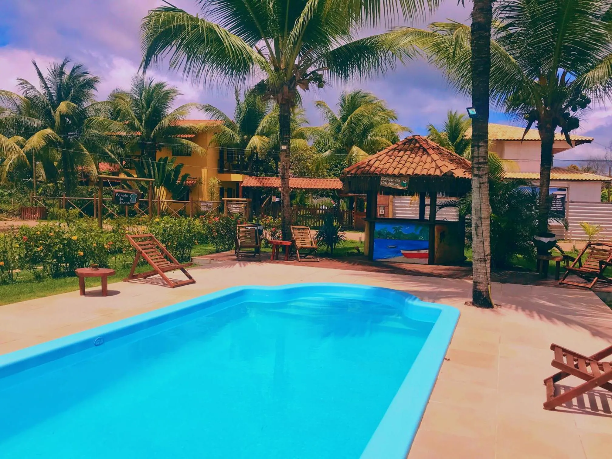 Swimming pool in Pousada Perola da Barra