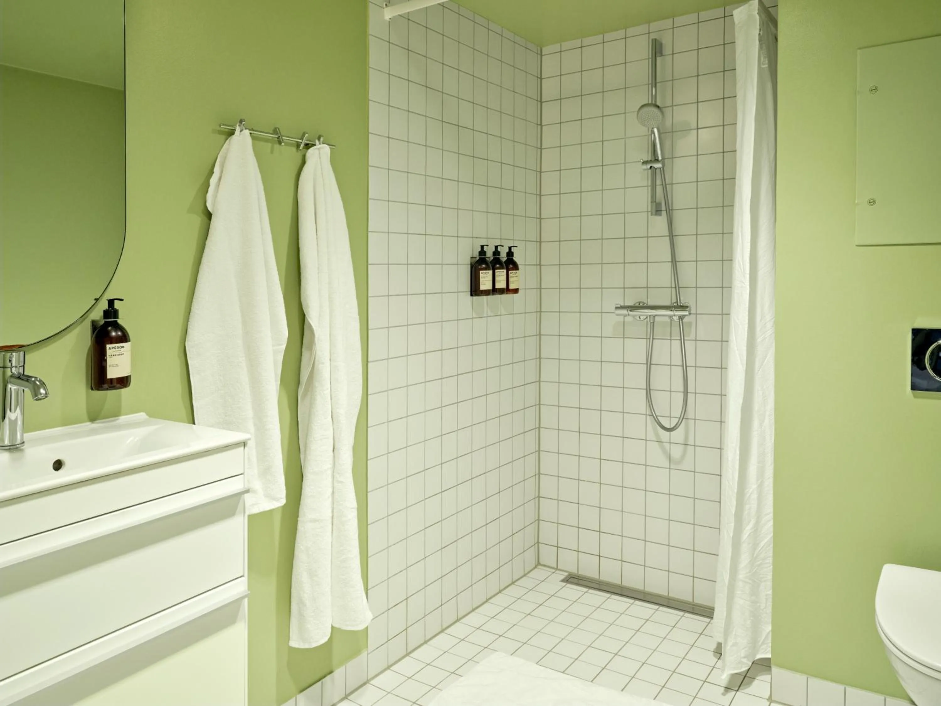 Bathroom in Apēron Apartment Hotel