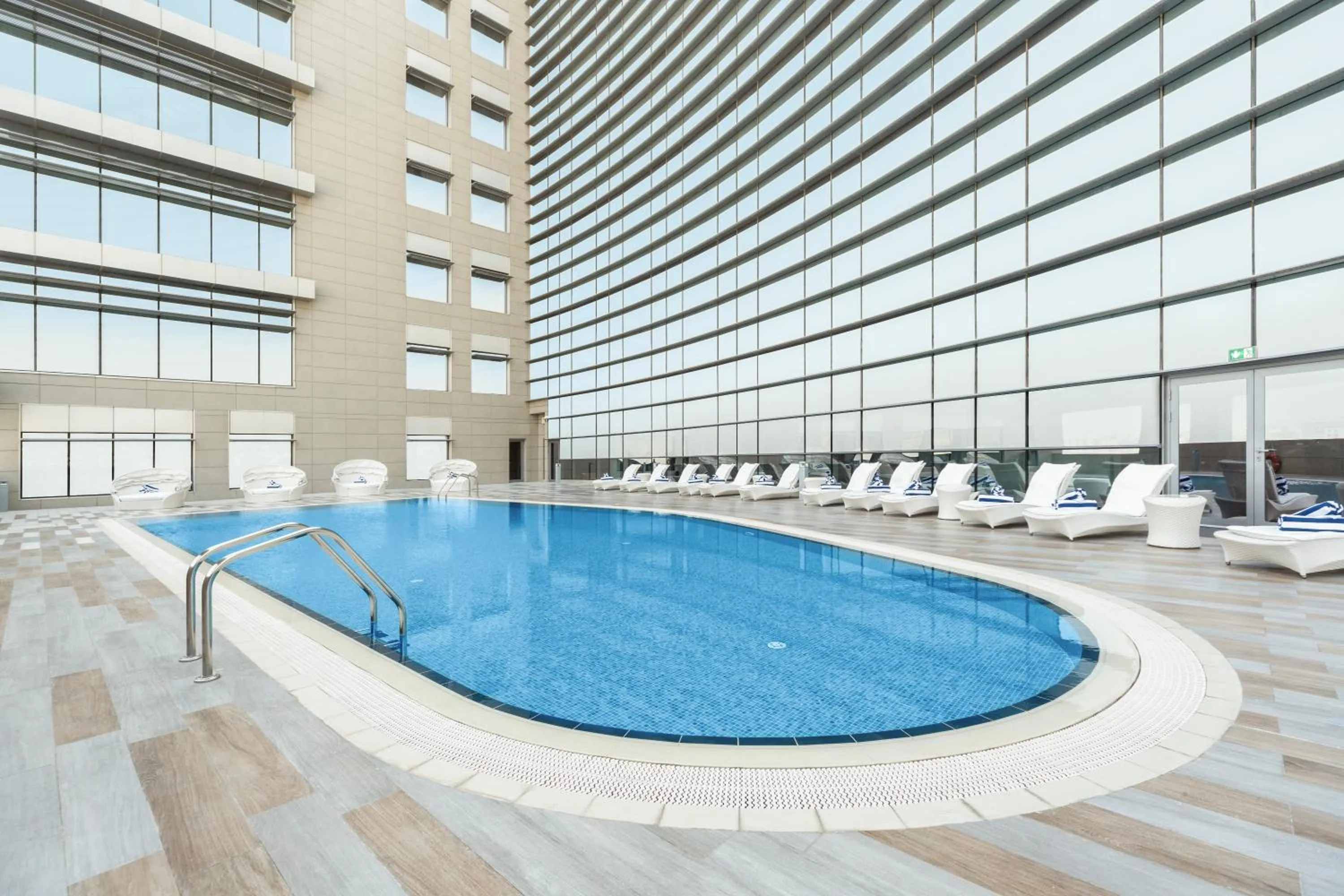 Swimming pool in dusitD2 Salwa Doha
