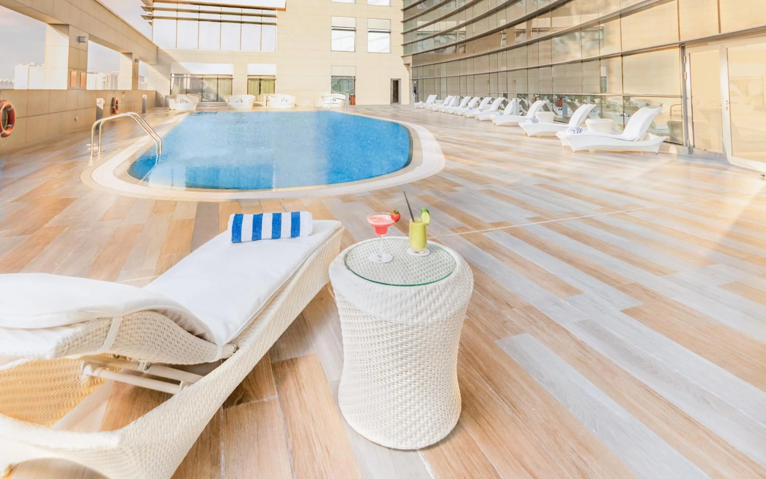 Swimming pool in dusitD2 Salwa Doha