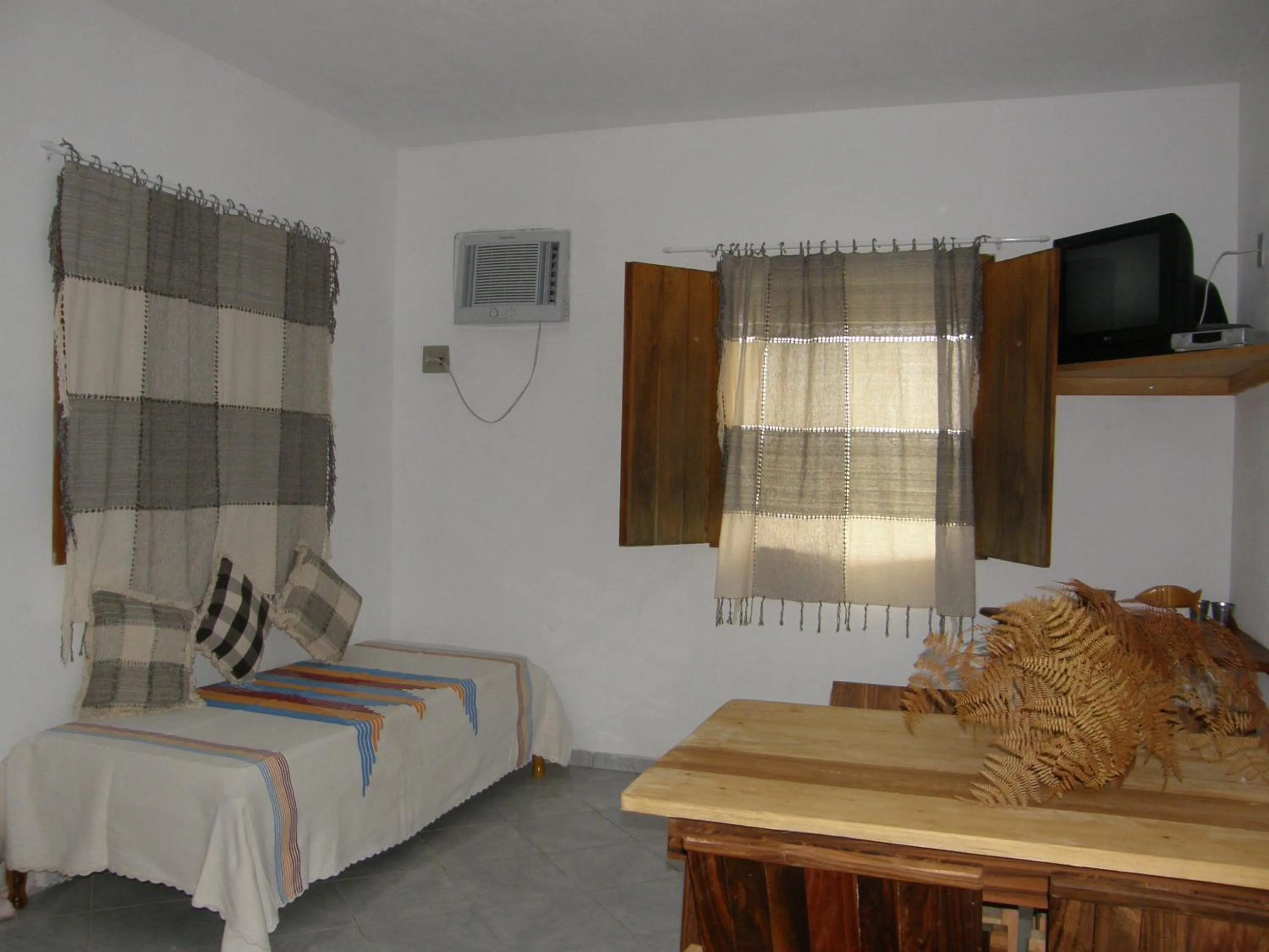 Communal lounge/ TV room, Bed in Sol da Onda Pousada e Flats