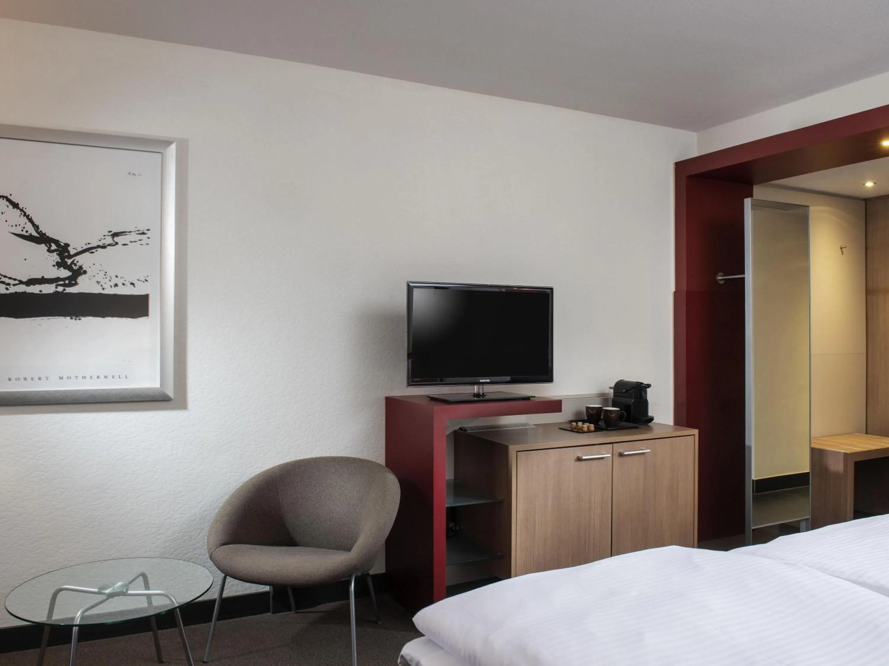 Bedroom, Bed in Mövenpick Hotel Münster am Aasee