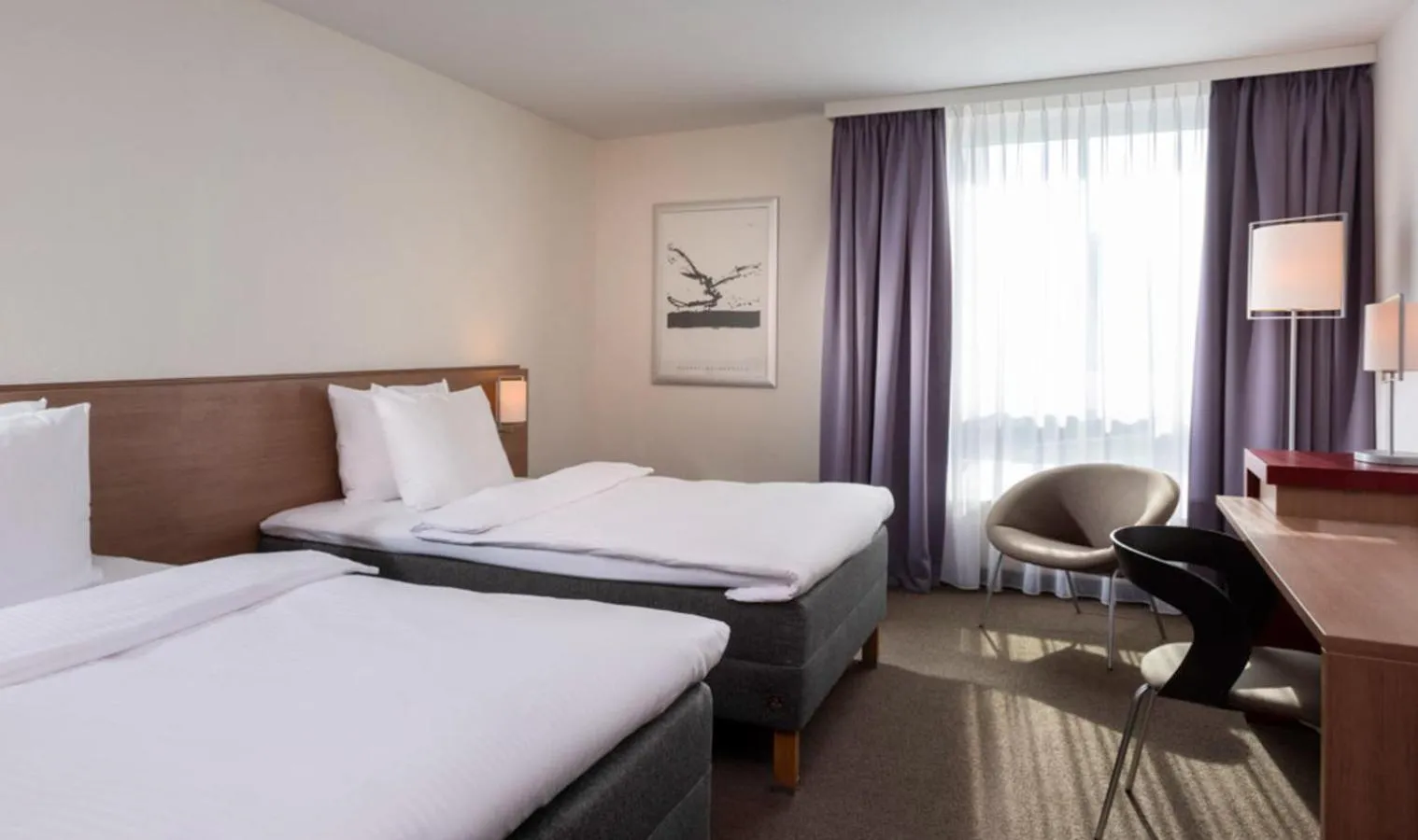 Photo of the whole room, Bed in Mövenpick Hotel Münster am Aasee