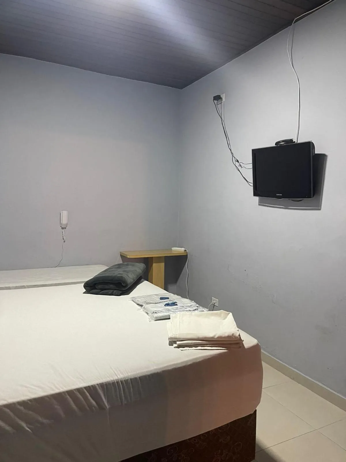 Bed in Hotel Carrão