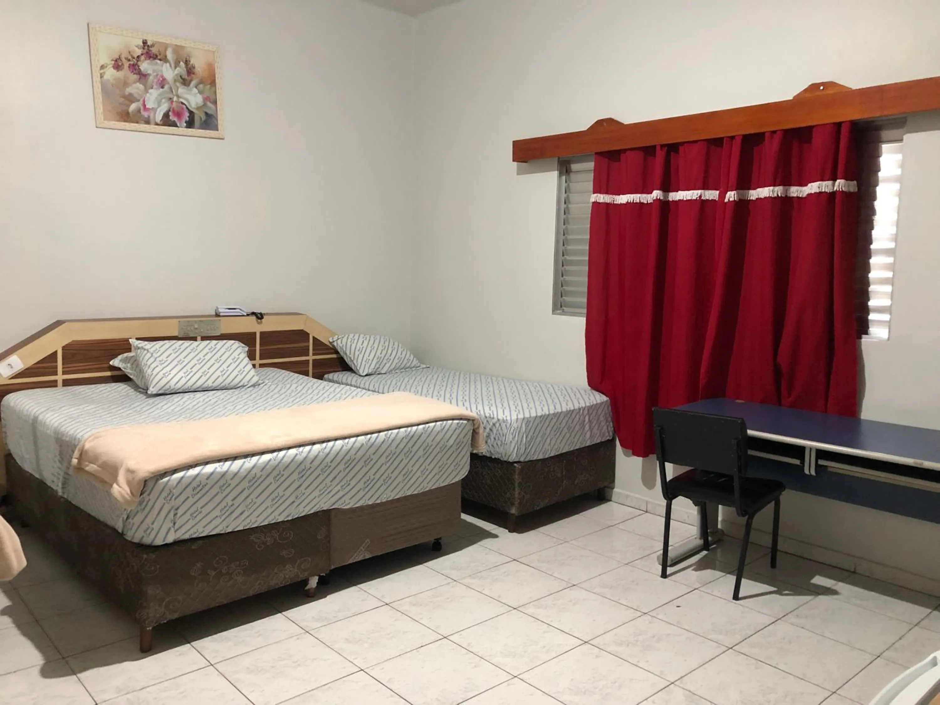 Bed in Hotel Carrão