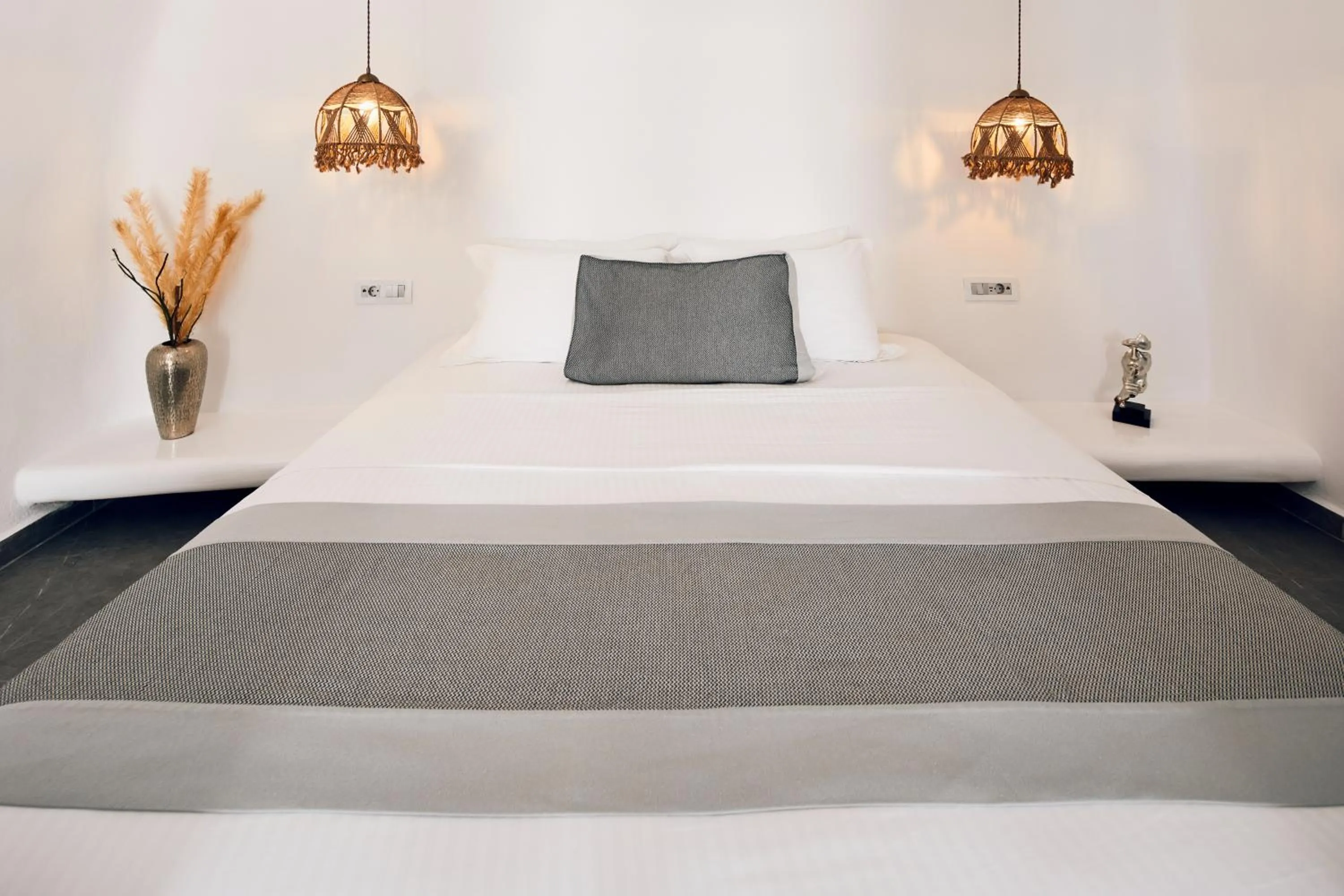 Bed in Allure Breeze Suites