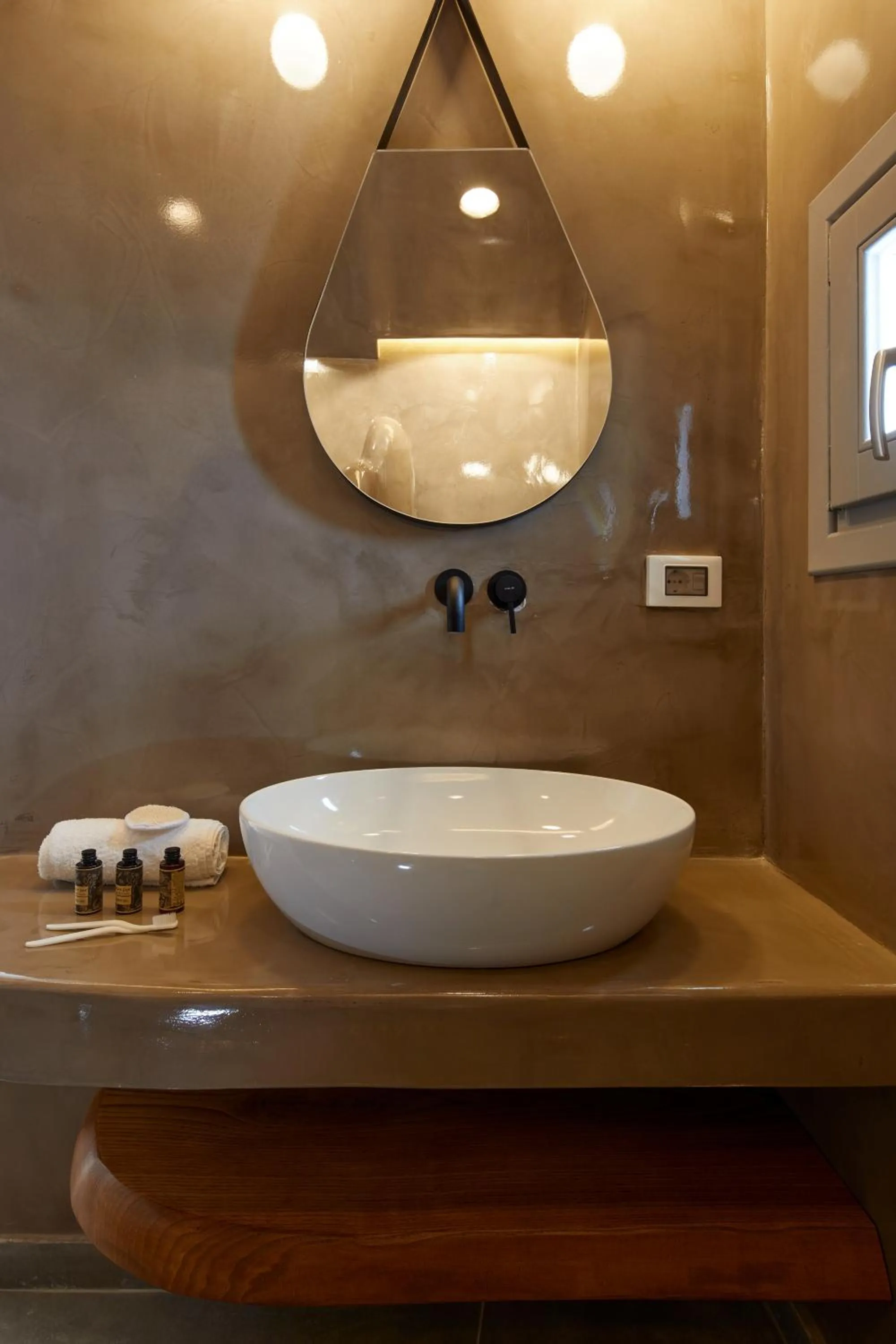 Bathroom in Allure Breeze Suites