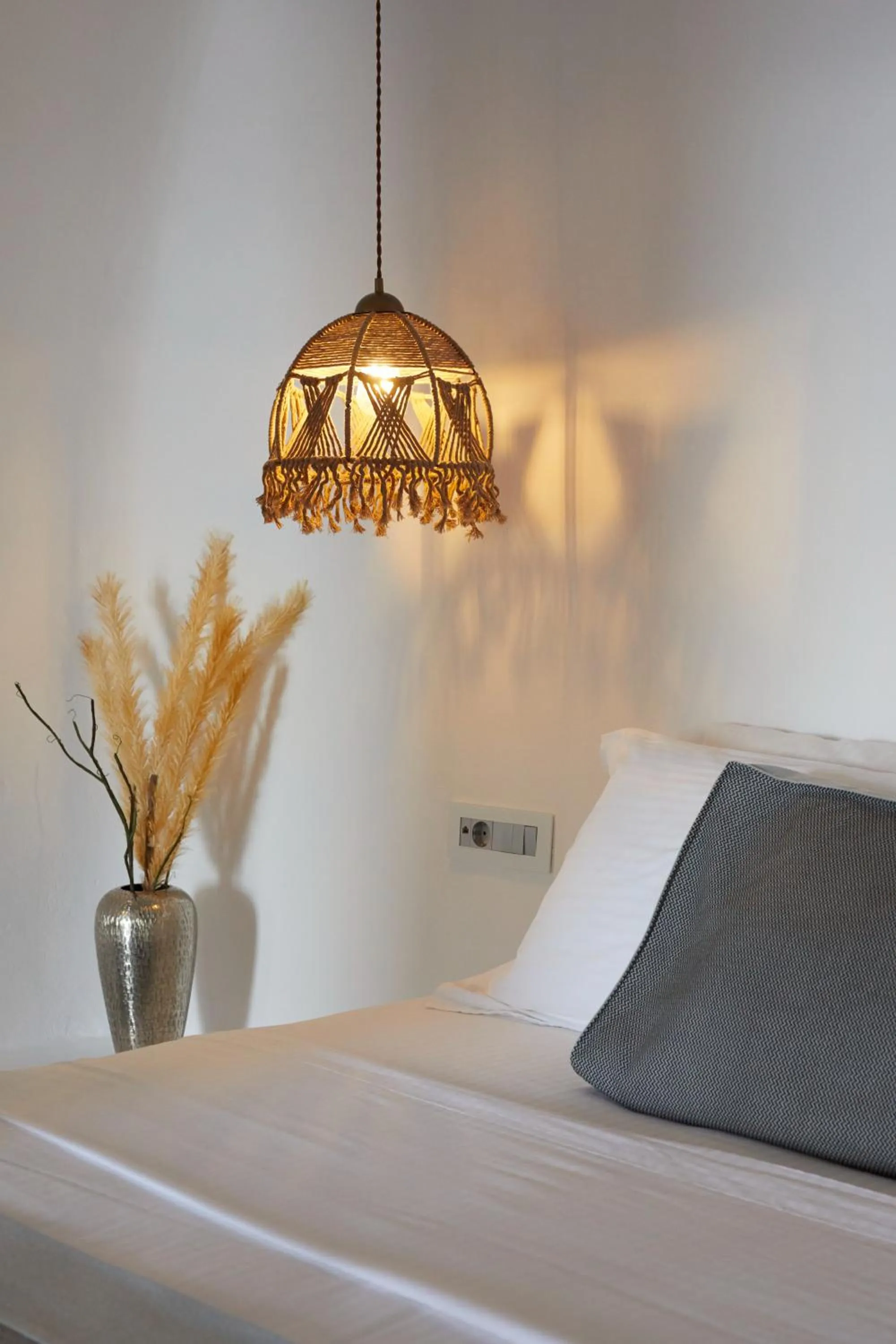 Bed in Allure Breeze Suites