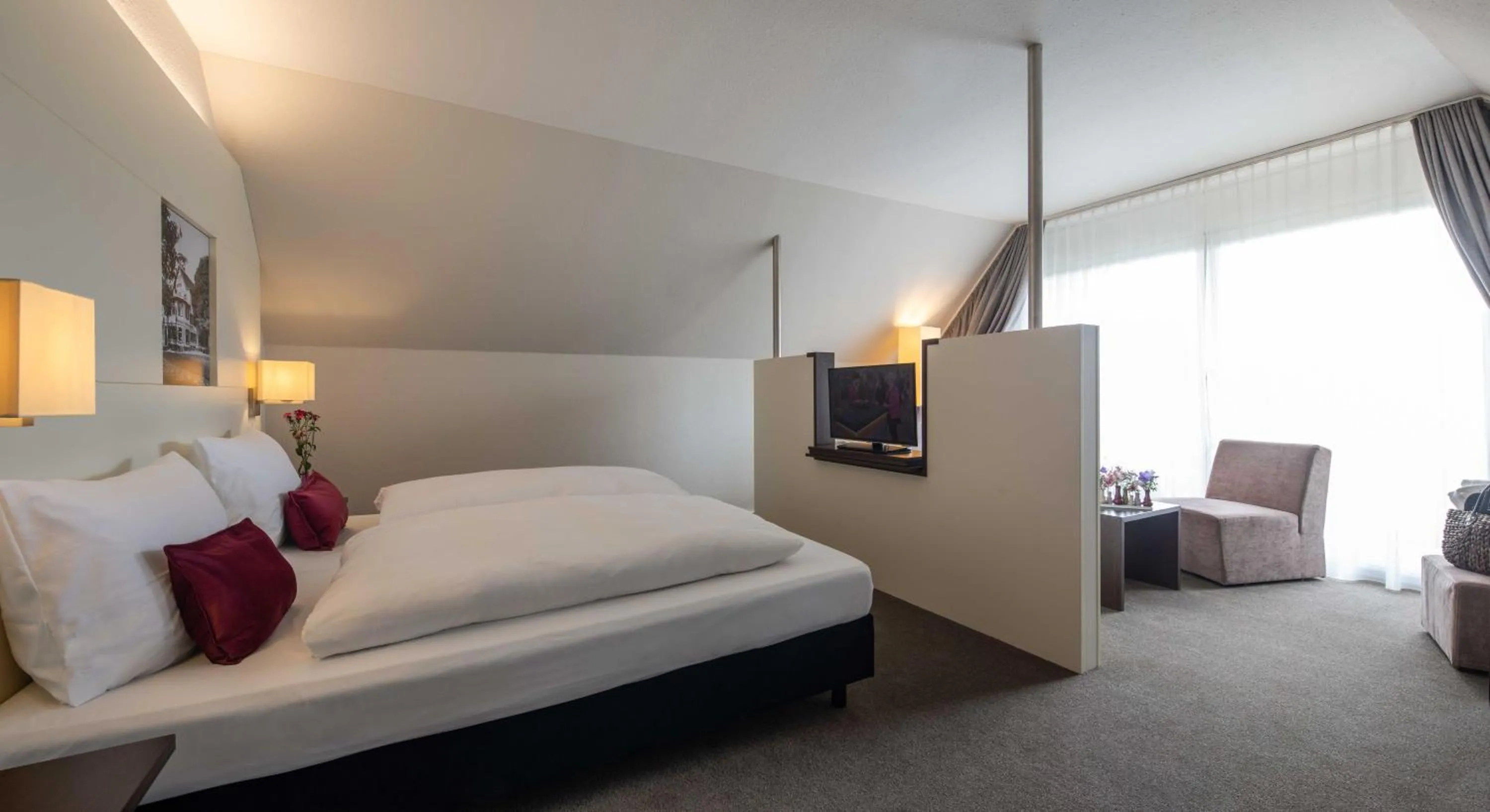 Bed in Ganter Hotel & Restaurant Mohren