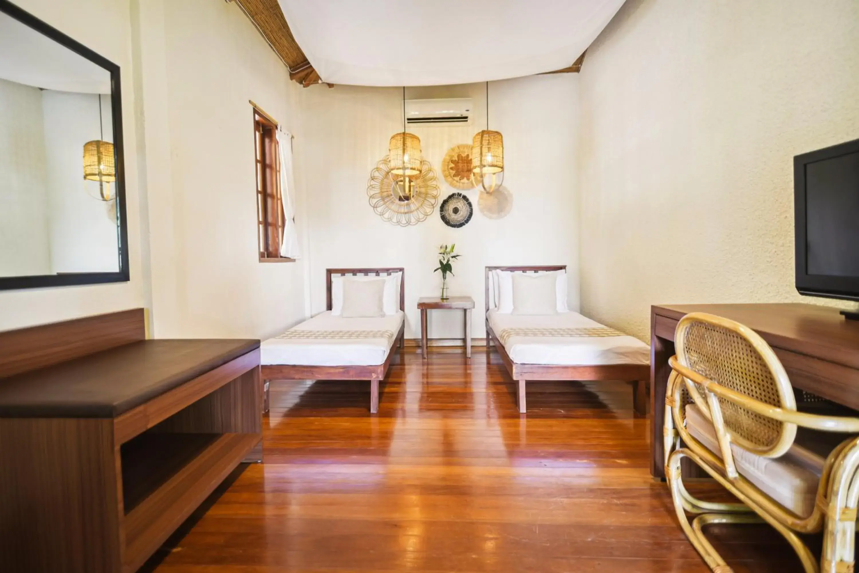 Bed in The Strand Boutique Resort Bed in The Strand Boutique Resort