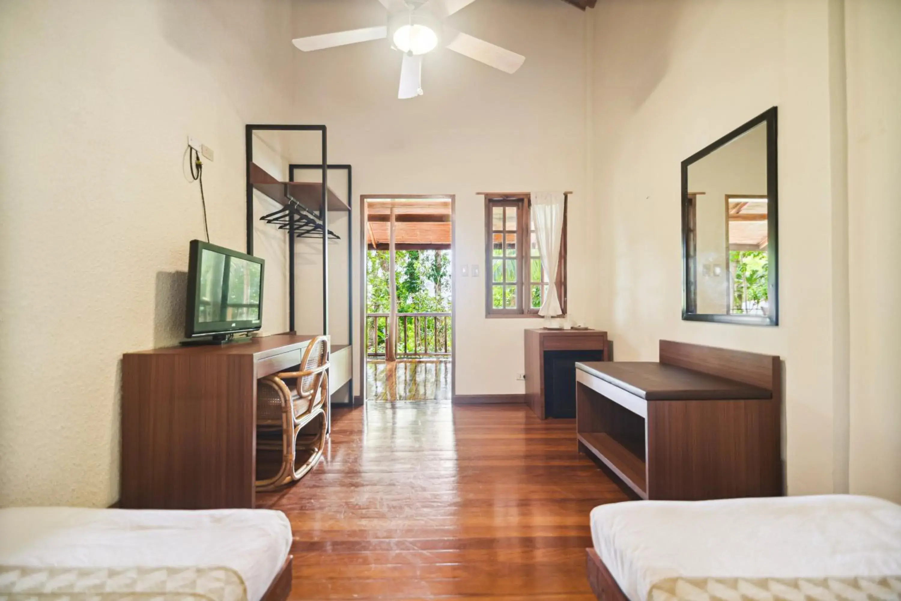 Bed in The Strand Boutique Resort Bed in The Strand Boutique Resort