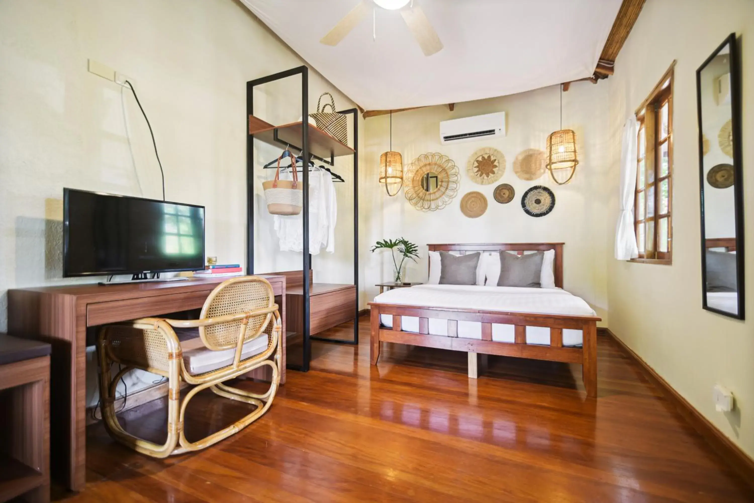 Bed in The Strand Boutique Resort Bed in The Strand Boutique Resort