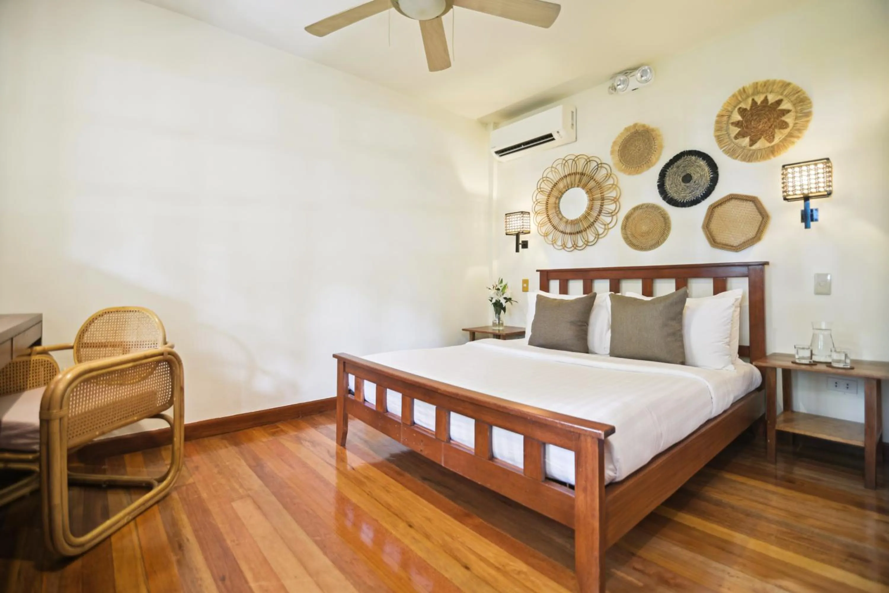 Bed in The Strand Boutique Resort