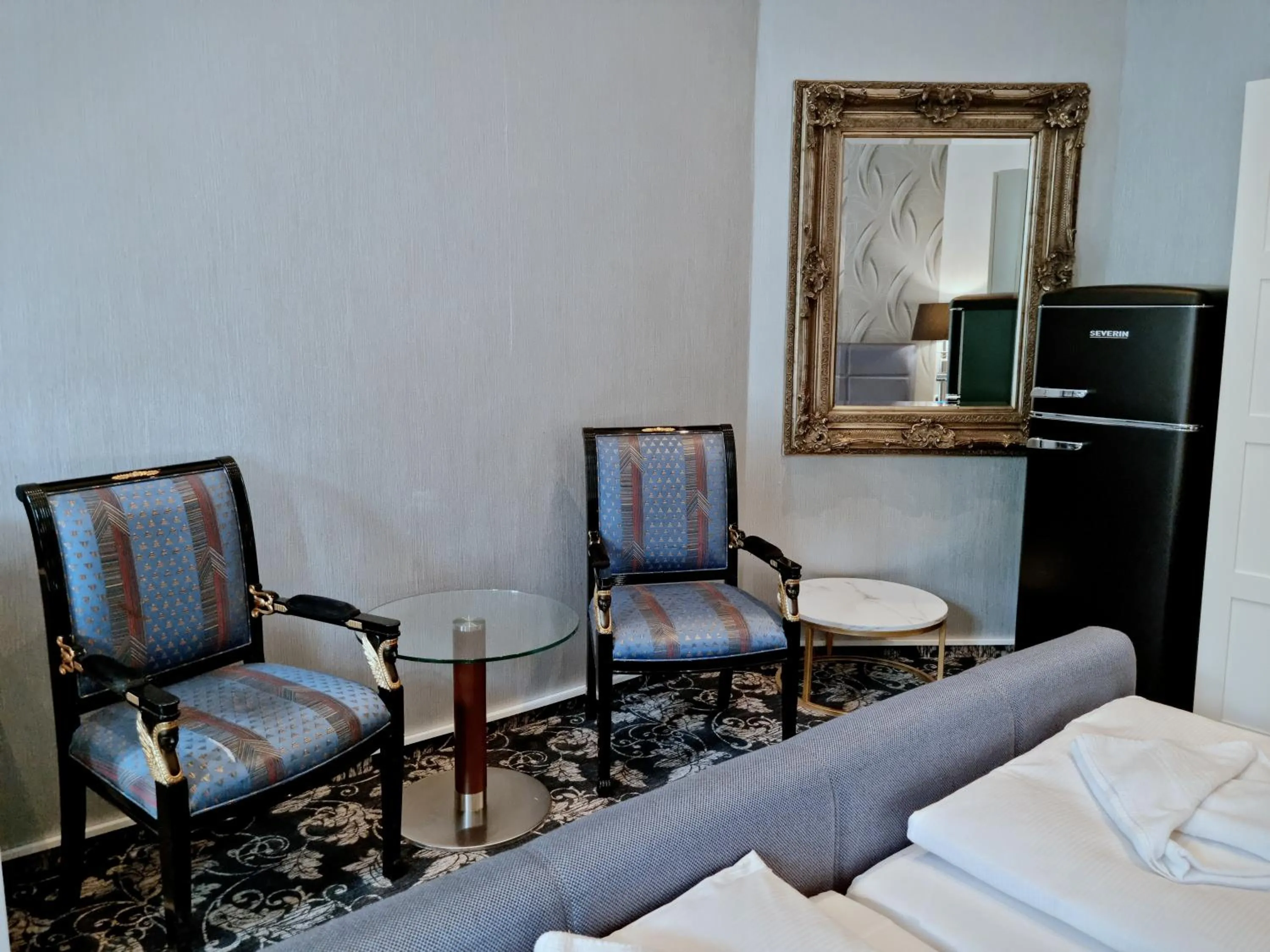 Seating area, Bed in Hotel Gasteiner Hof