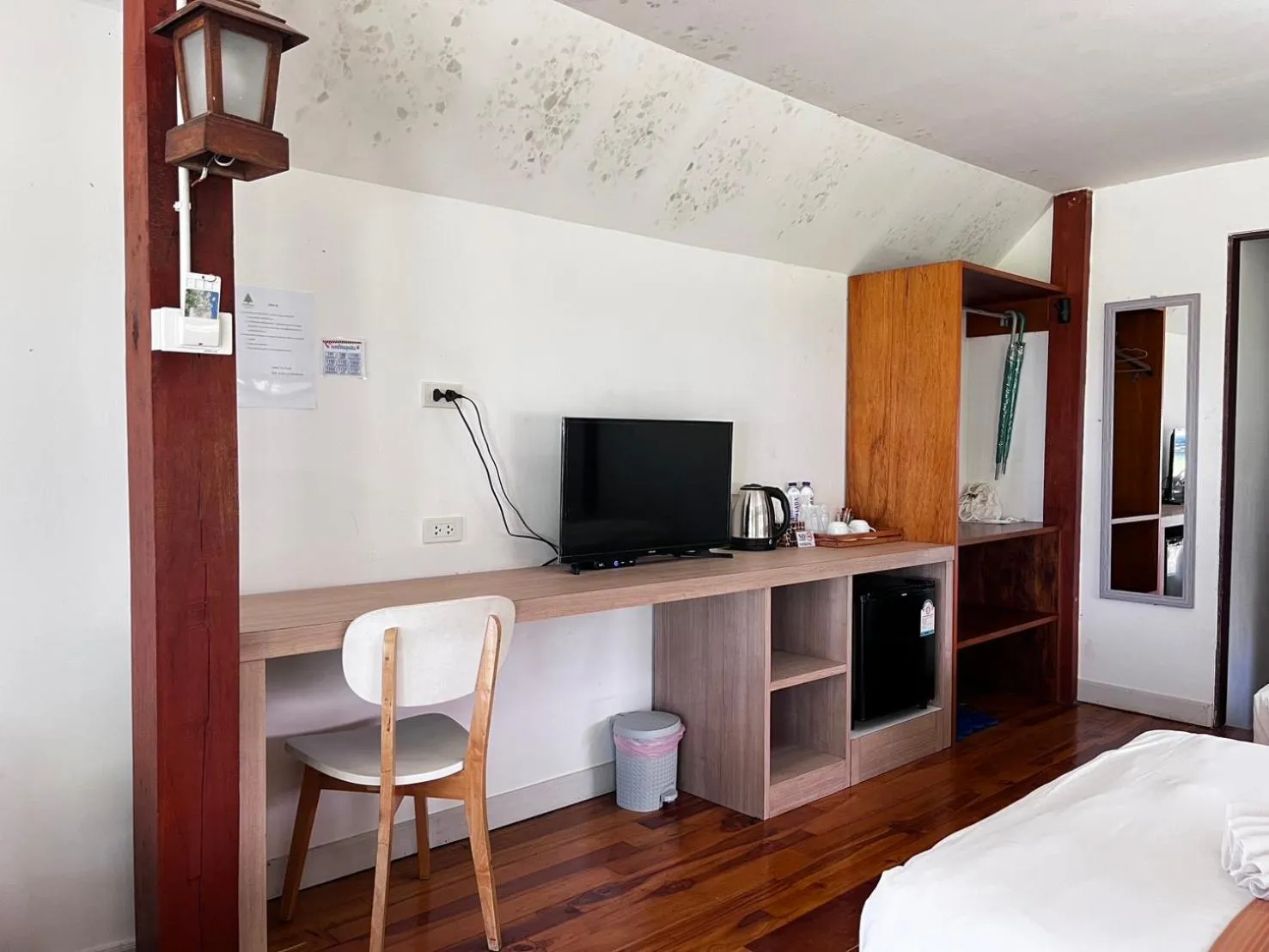 Seating area, Bed in The Chevalley Beach Resort