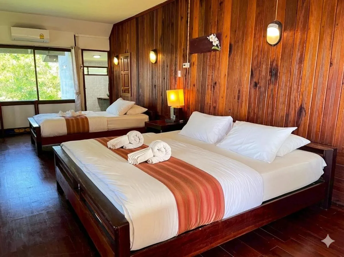 Photo of the whole room, Bed in The Chevalley Beach Resort