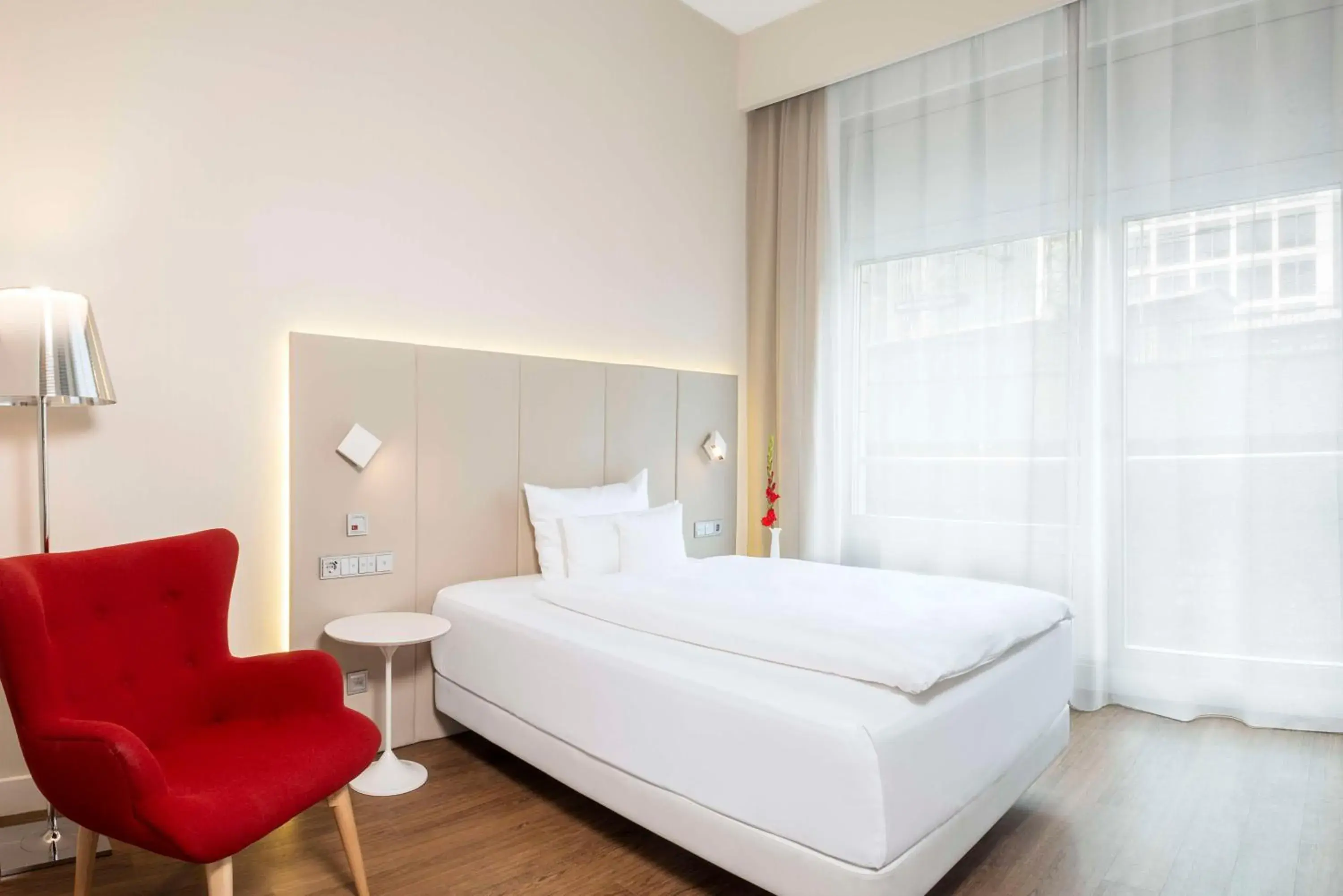 Bedroom, Bed in NH Collection Berlin Mitte Friedrichstrasse Bedroom, Bed in NH Collection Berlin Mitte Friedrichstrasse