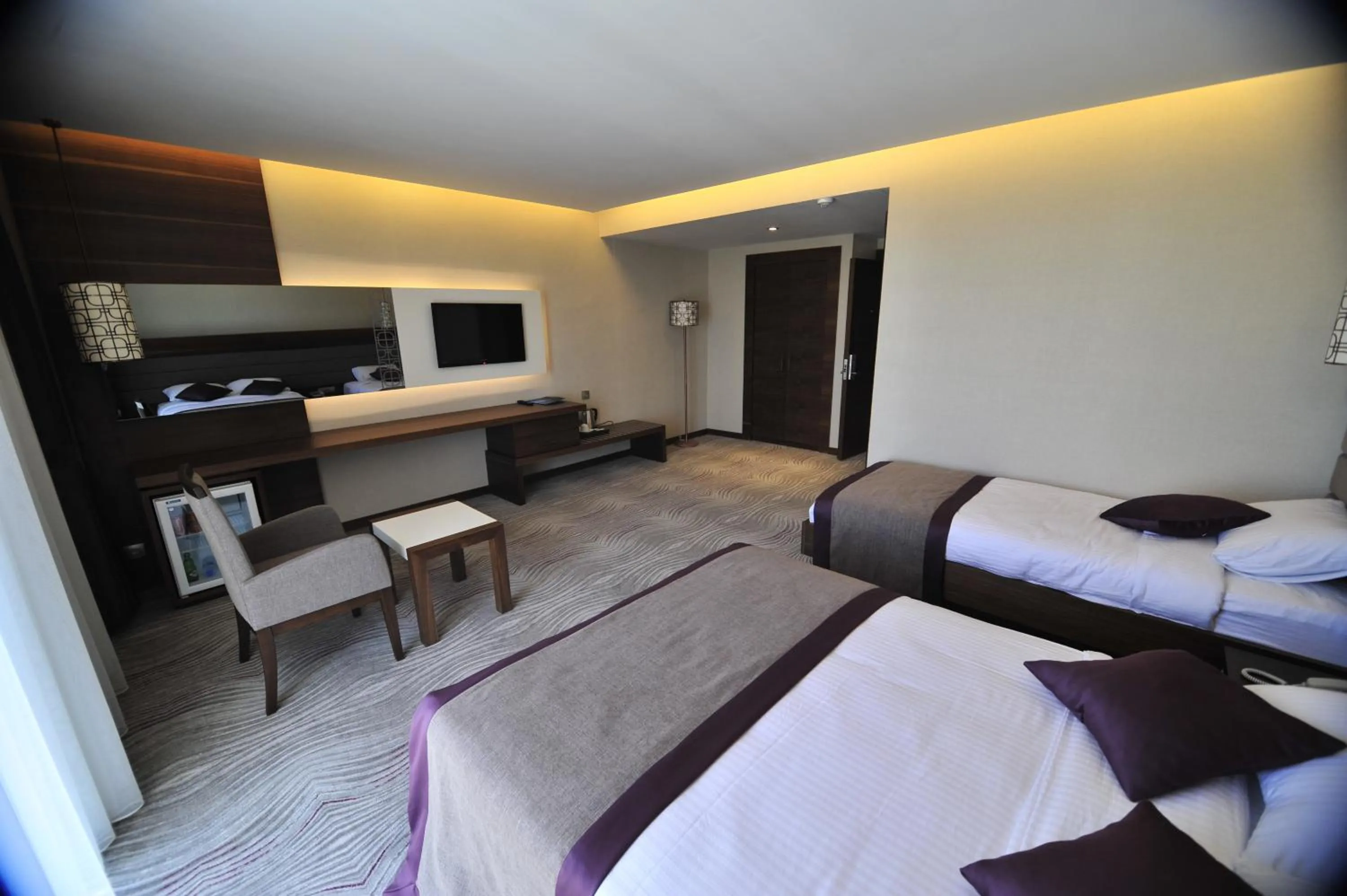 Bed in Grand Cenas Hotel