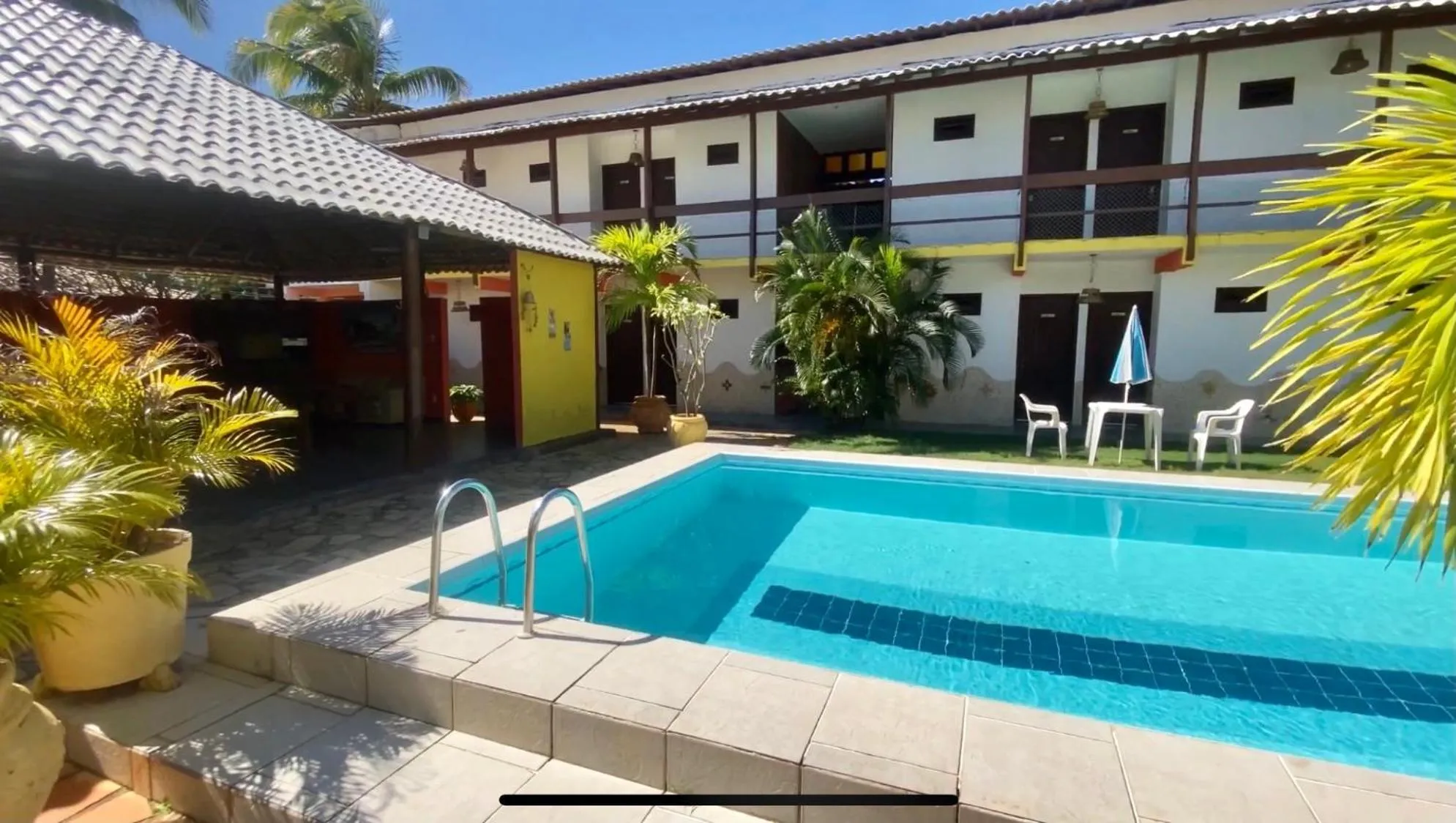 Swimming pool in EcoVila-Zen Bougainville - Hotel Pousada