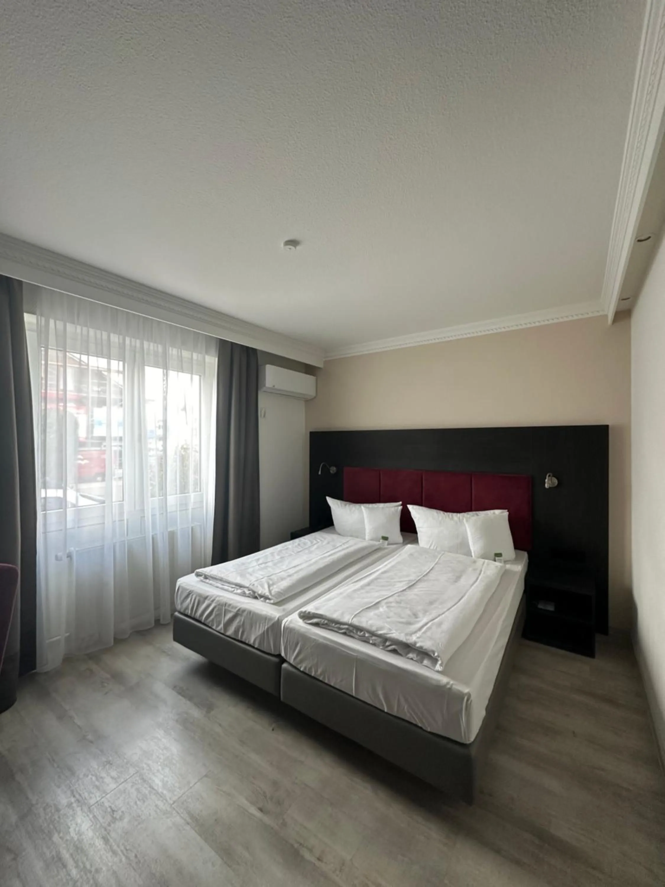 Photo of the whole room, Bed in Astralis Hotel Domizil