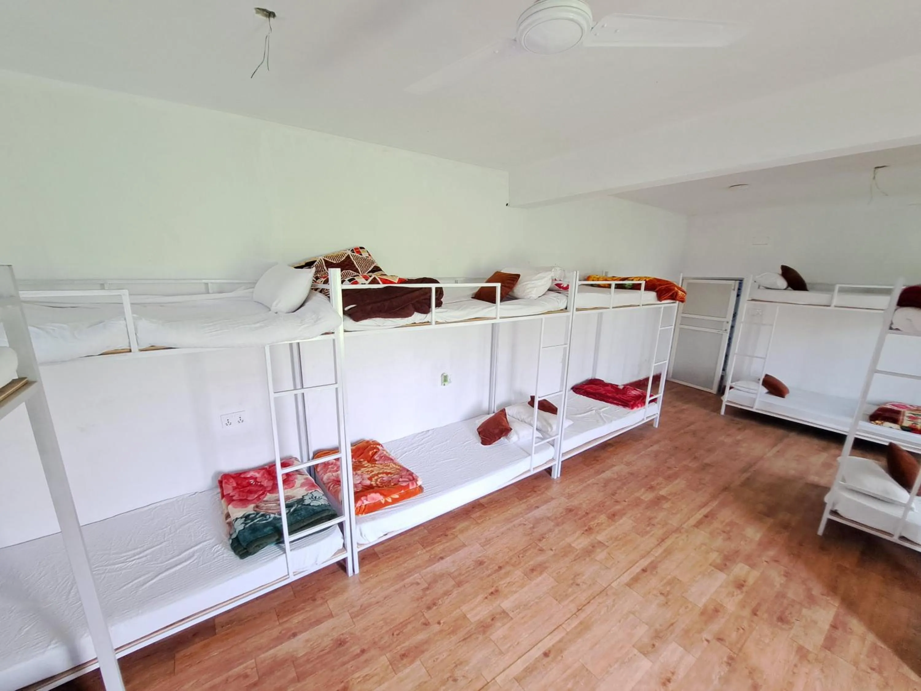 Bed in Hong Qi Hotel