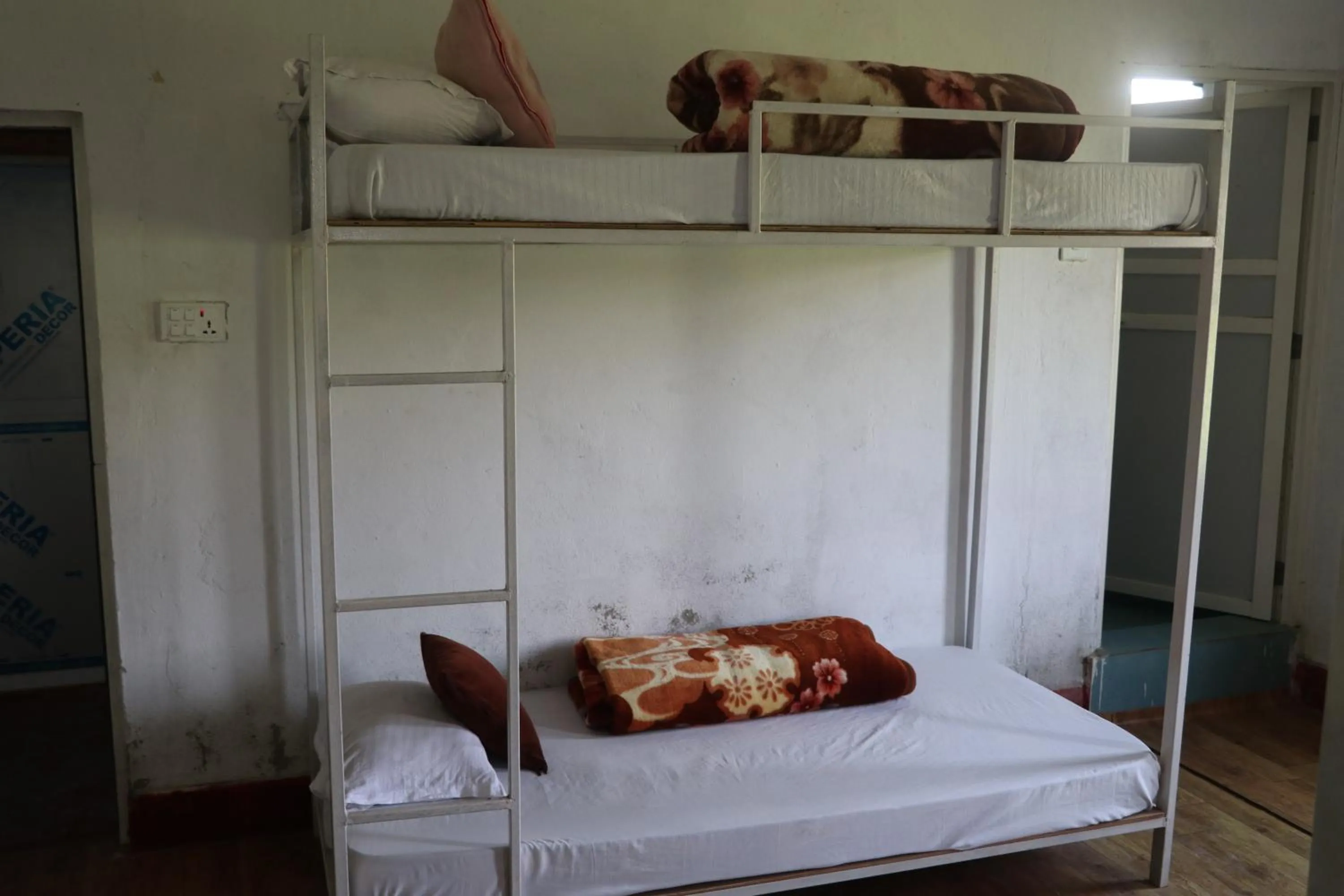 Bed in Hong Qi Hotel