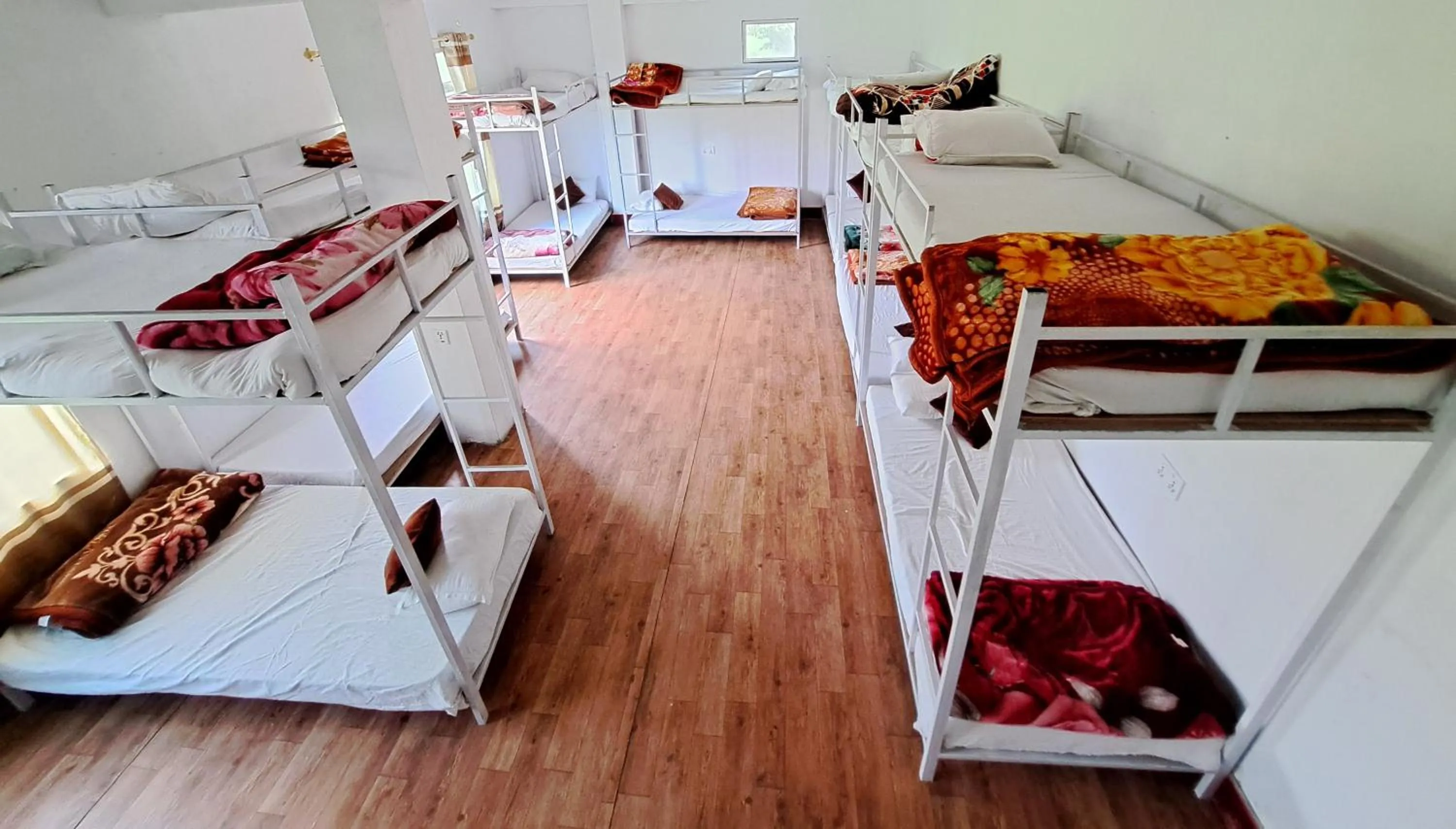 Bed in Hong Qi Hotel