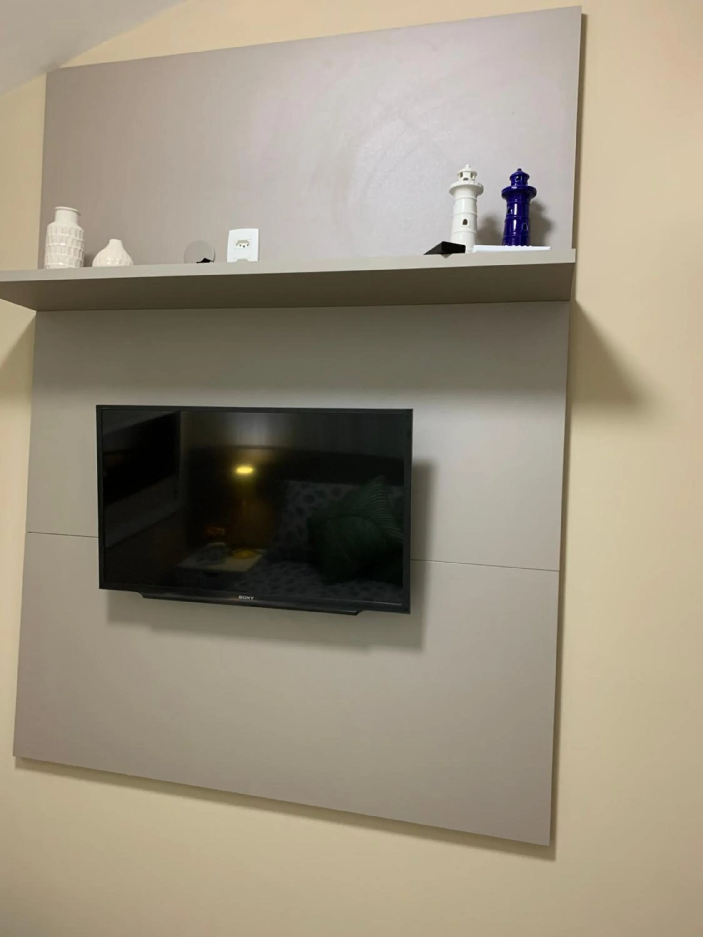 TV and multimedia in Flat Oka beach residence luxo