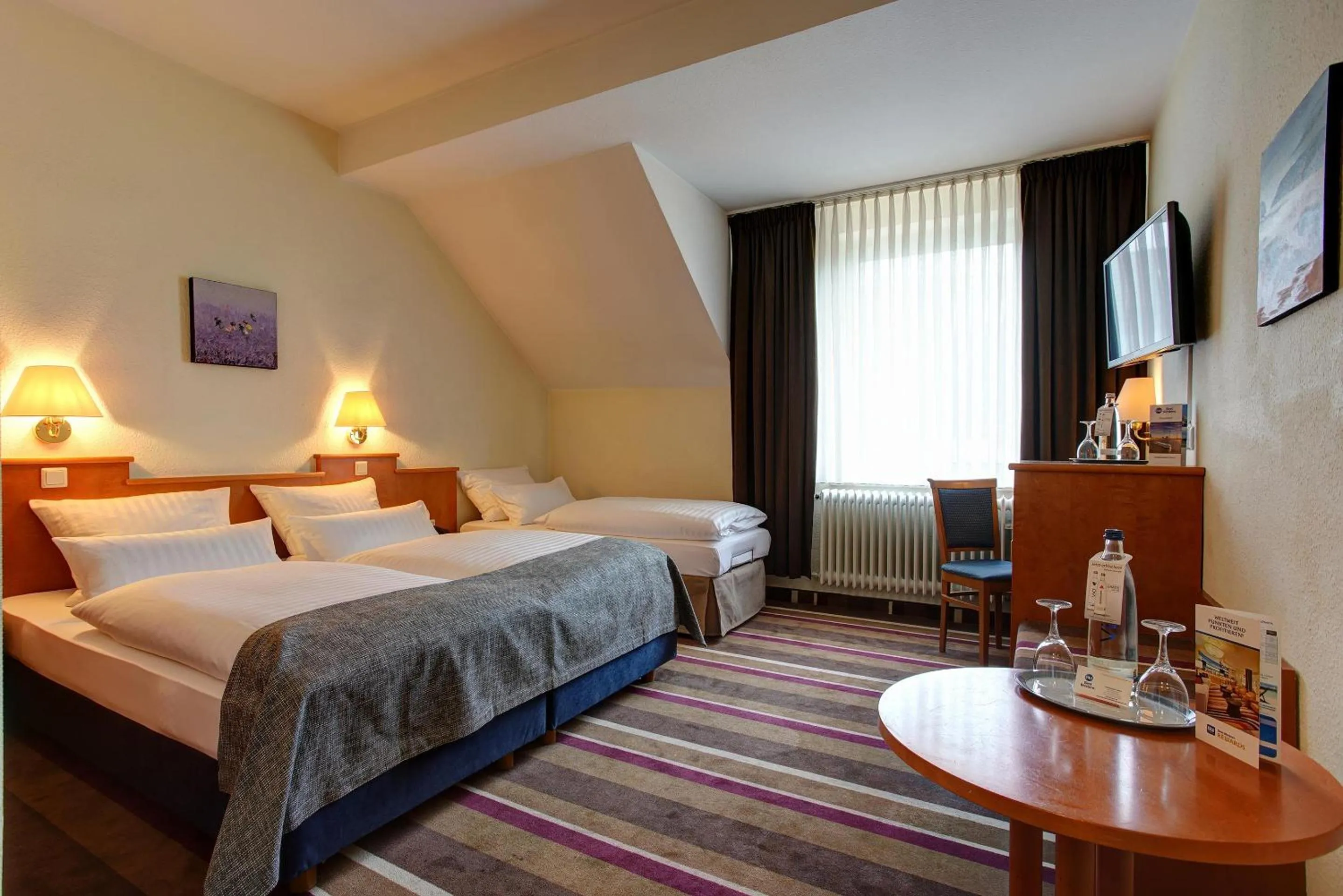 Bedroom, Bed in Sure Hotel by Best Western Ambassador Duesseldorf