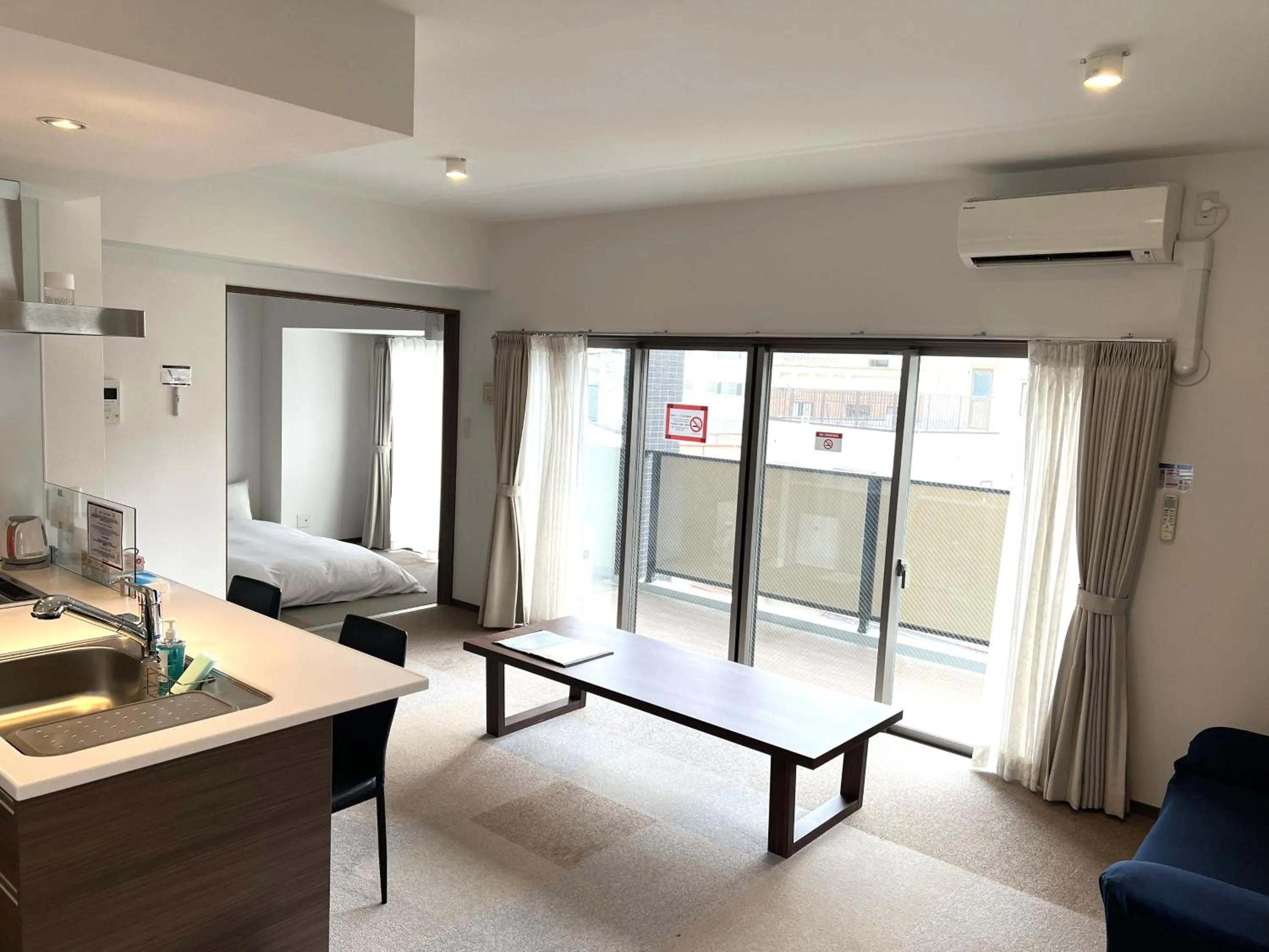 Living room, Bed in A.T. Hotel Hakata